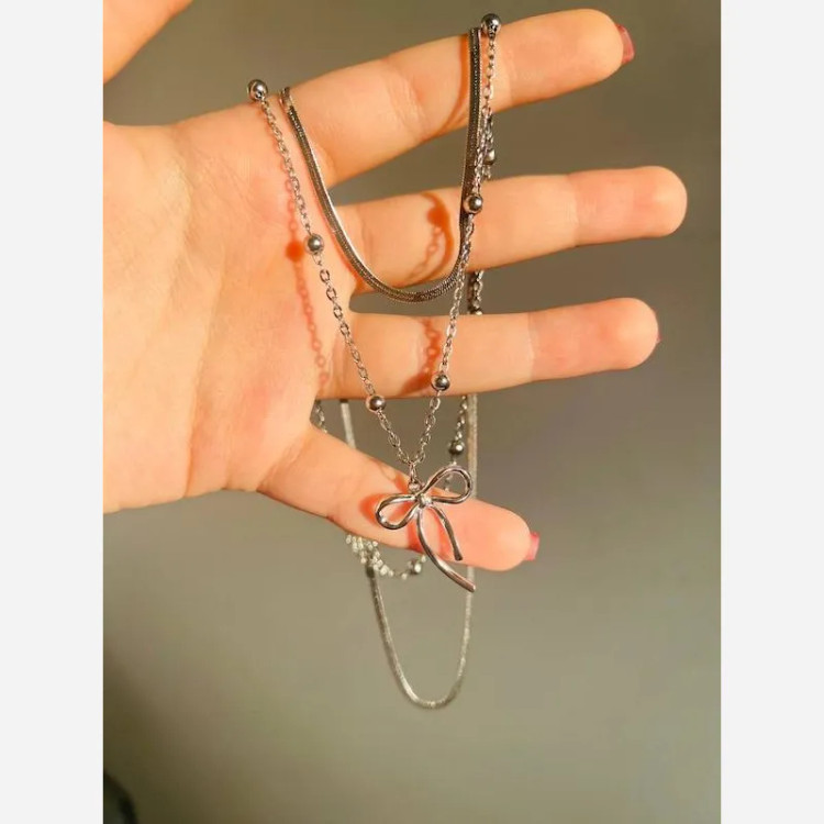 گردنبند دخترانه دو لاین استیل طرح پاپیون رنگ نقره ای