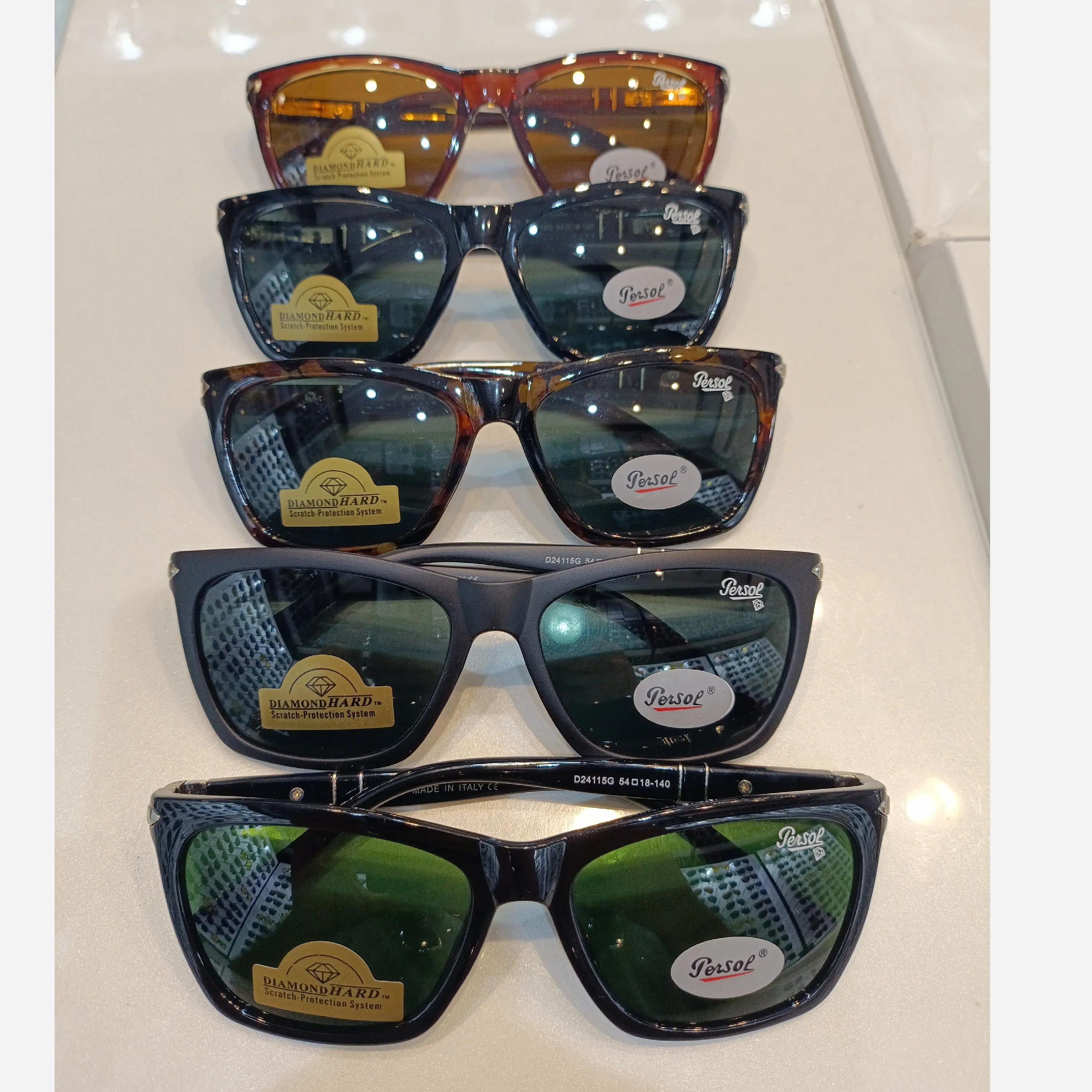 عینک آفتابی پرسول شیشه سنگ persol ایتالیا دسته فنر دارای آنتی رفلکس کد 24115