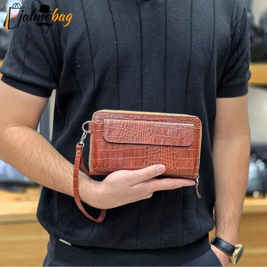 کیف دستی و دوشی چرم طبیعی ظفر دارای بند مچی و بند بلند قابل تنظیم
