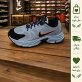 کفش کتانی زنانه نایک مدل نیو فیس رنگ طوسی مشکی با رویه چرم مصنوعی و زیره پلیمر سایز 37 تا 40