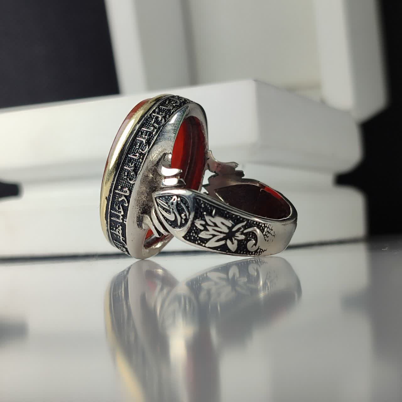 انگشتر عقیق قرمز حکاکی حرز امام جواد رکاب نادعلی رکاب آلیاژی و تاج برنجی باکیفیت کد 3637