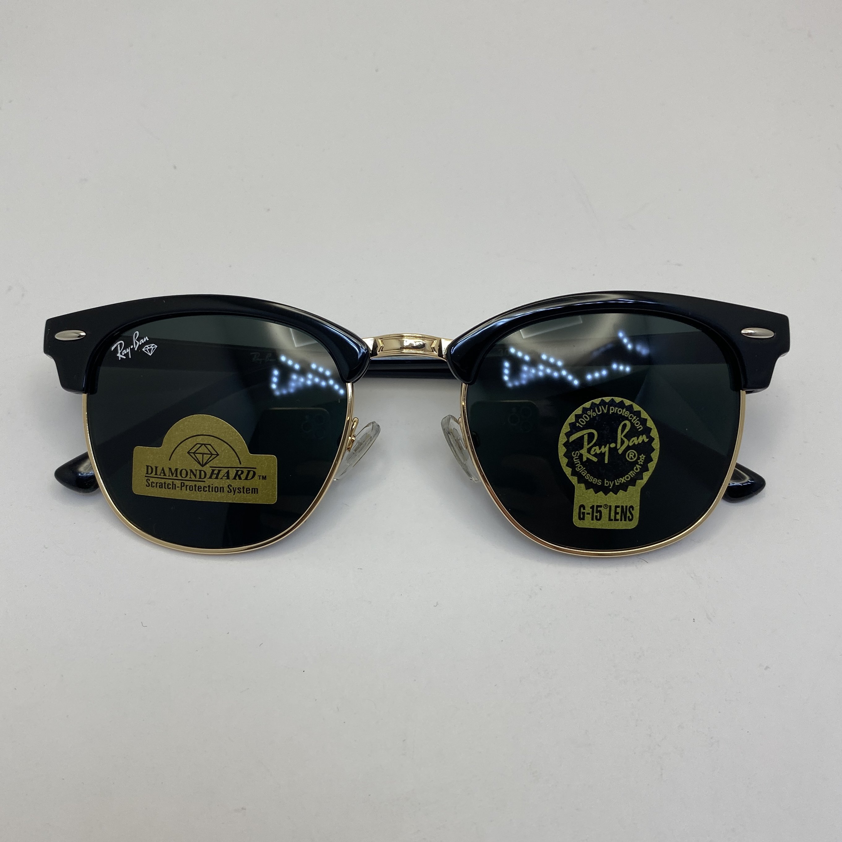 عینک ریبن rayban کلاب مستر شیشه سنگ مشکی طلایی RB 3016 با پک کامل اورجینال ریبن (جعبه،کیف،دستمال نانو،شناسنامه،کاتالوگ)