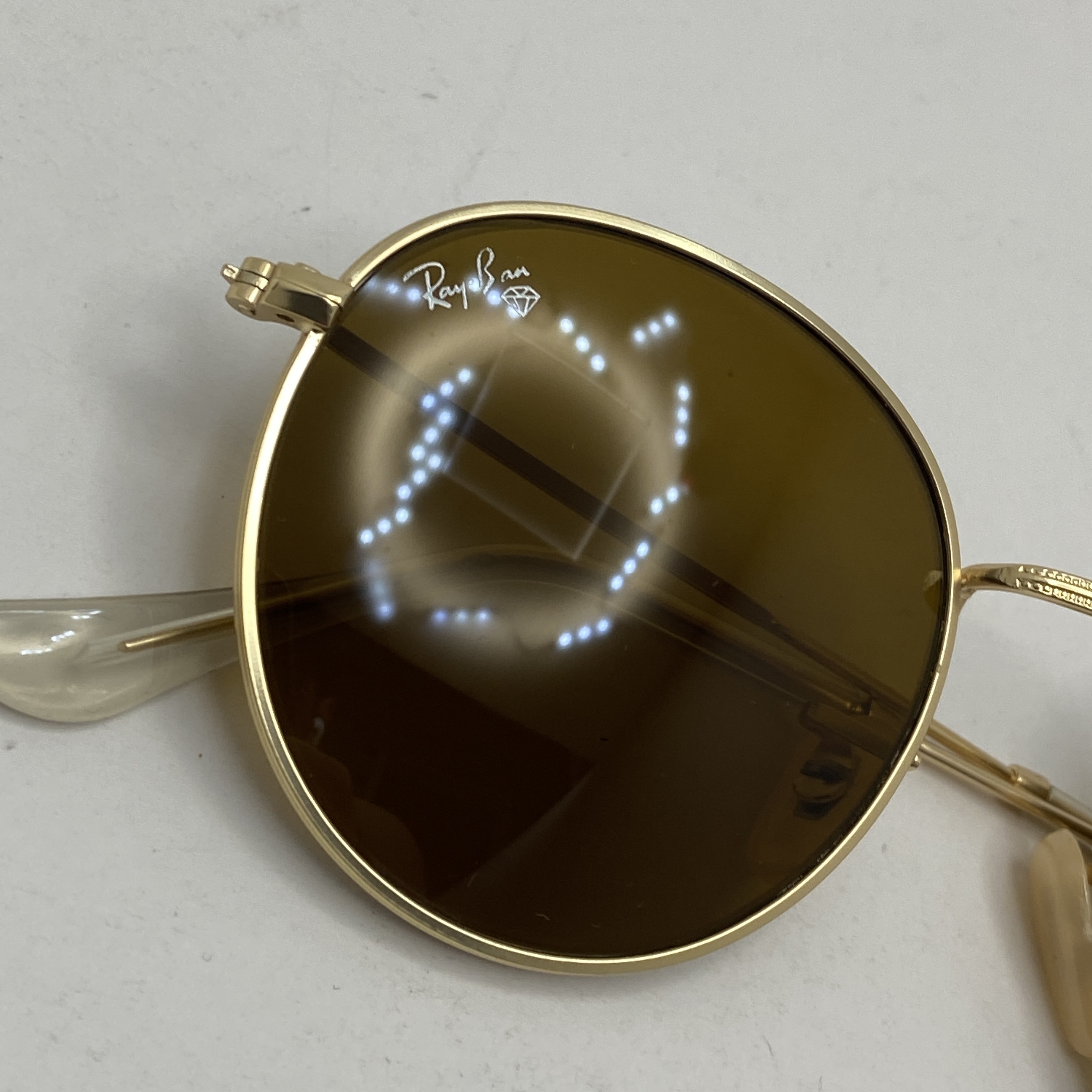 عینک آفتابی ریبن rayban گرد قهوه ای طلایی RB 3447