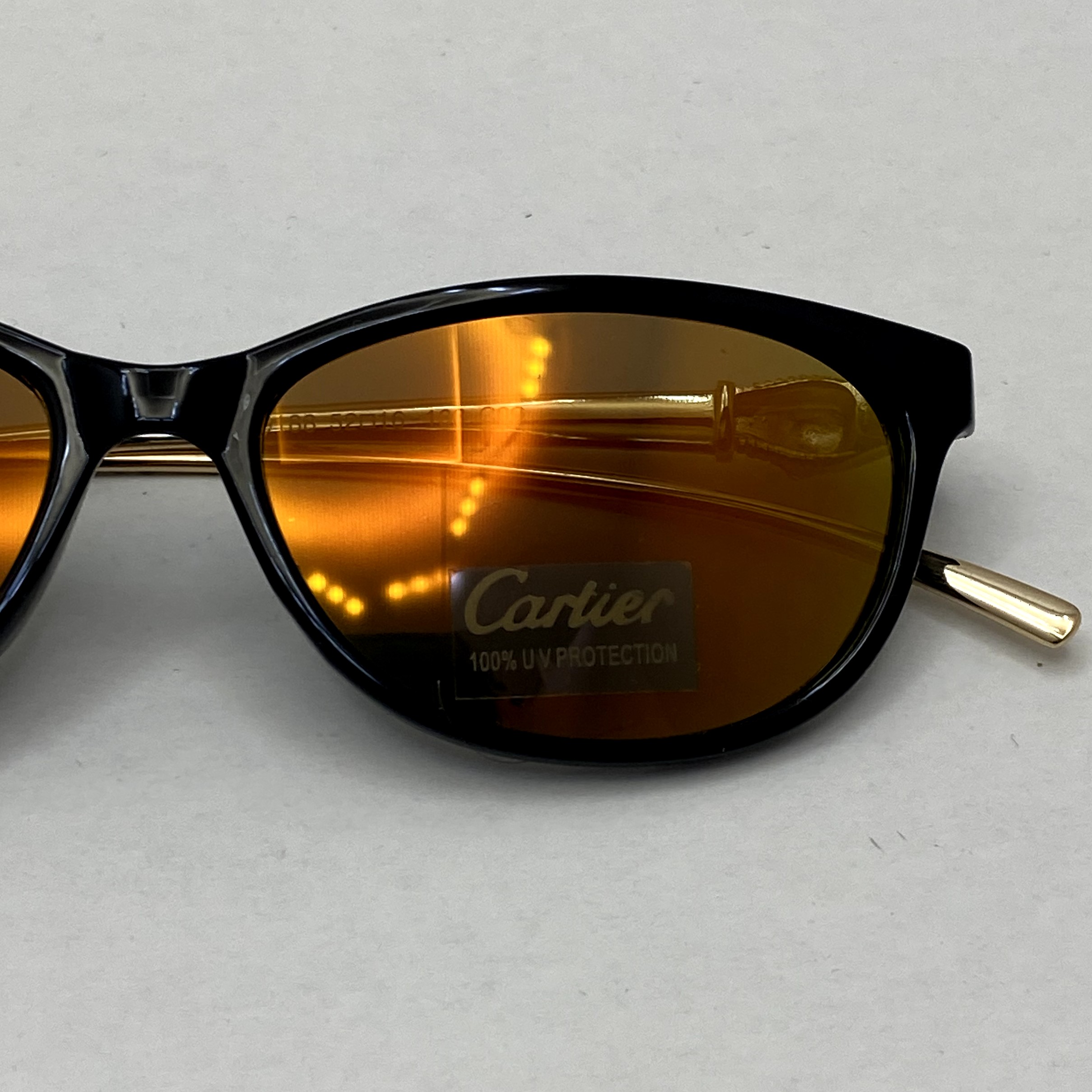عینک آفتابی زنانه کارتیر Cartier دسته نگین کاری شده فریم مشکی عدسی آتیشی