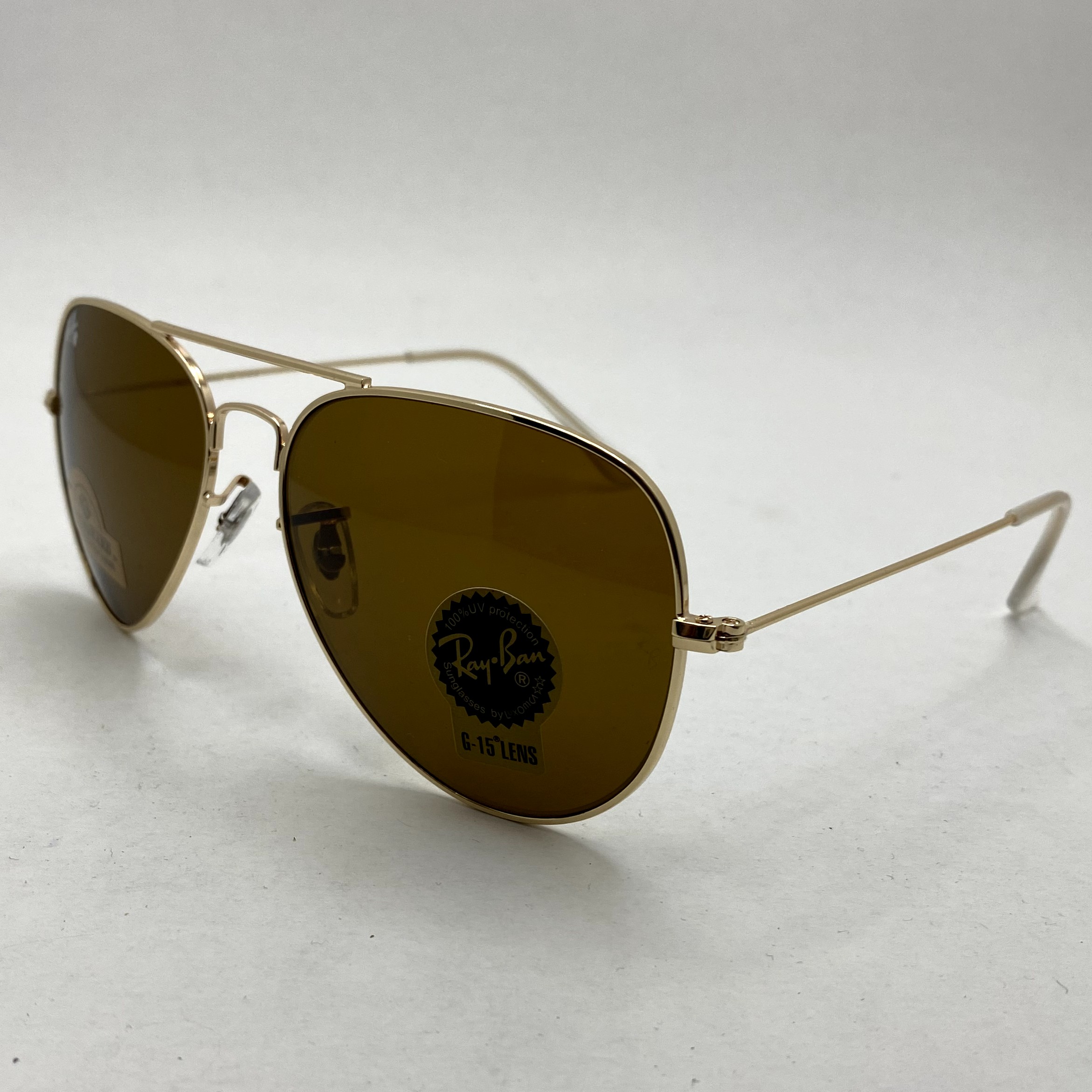 عینک آفتابی خلبانی AVIATOR ریبن rayban شیشه سنگ طلایی قهوه ای سایز 3026 فول پک