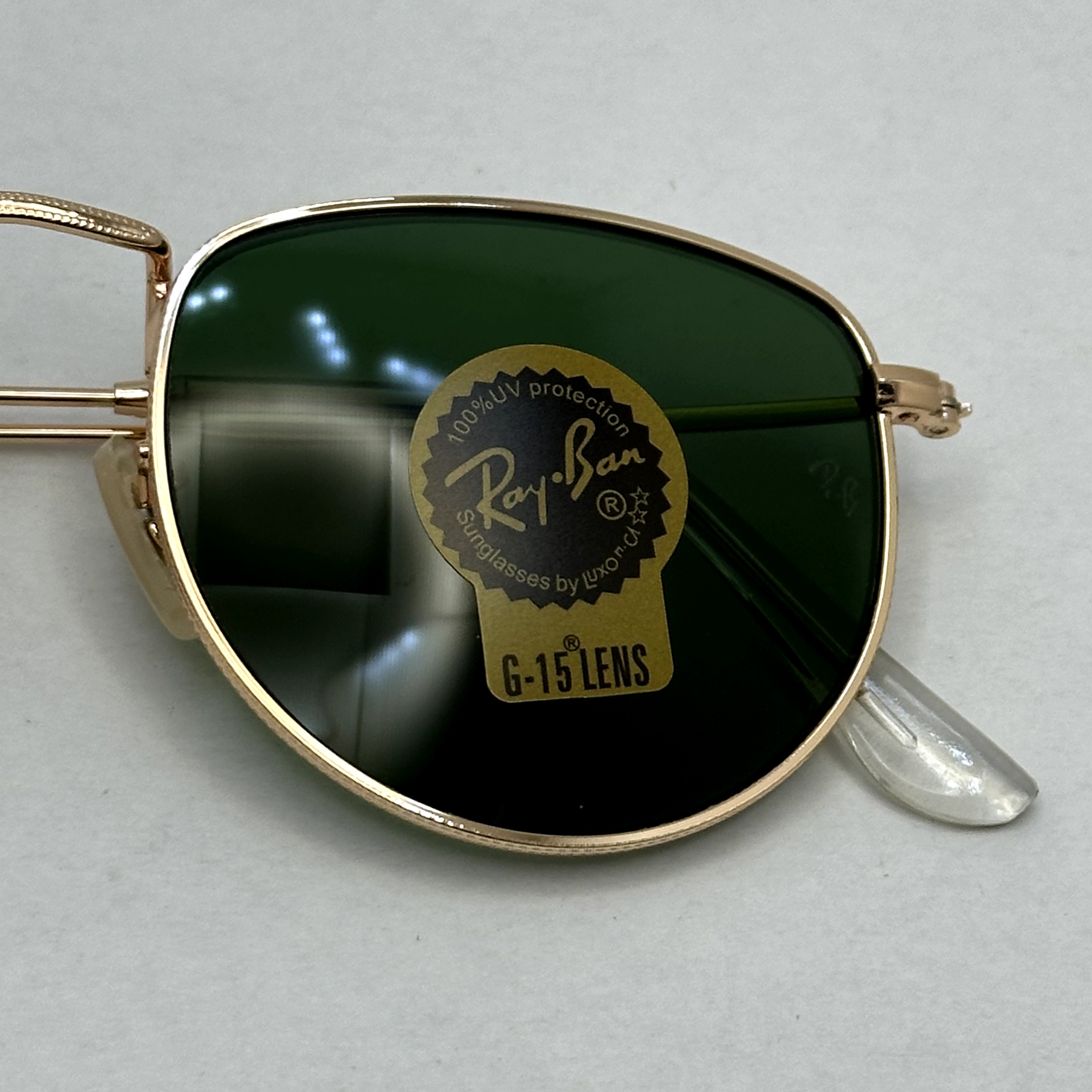 عینک آفتابی ریبن rayban شیشه سنگ سبز طلایی کد rb 3958 - فول پک (ارسال رایگان)