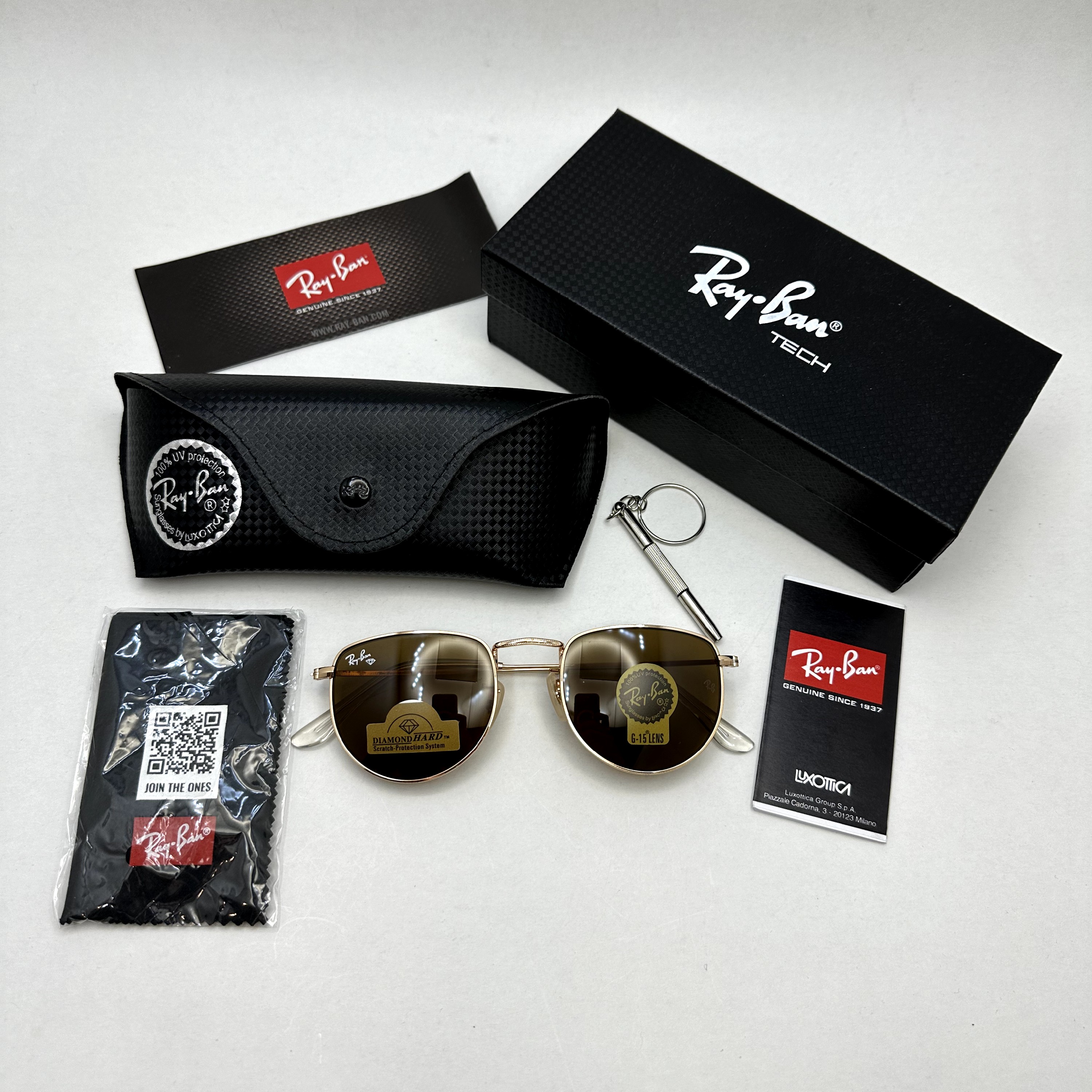 عینک آفتابی ریبن rayban شیشه سنگ قهوه ای طلایی کد rb 3958 - فول پک (ارسال رایگان)