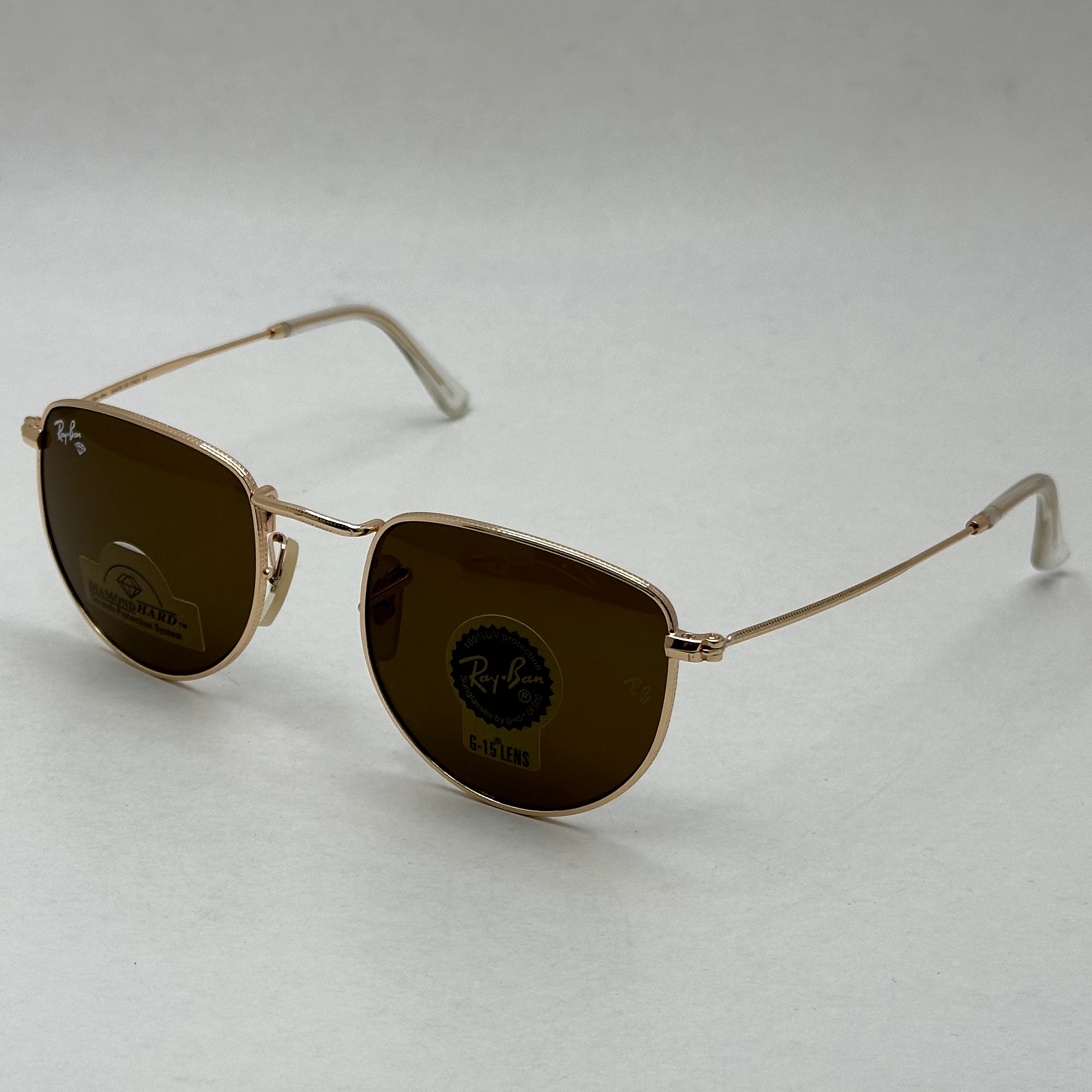 عینک آفتابی ریبن rayban شیشه سنگ قهوه ای طلایی کد rb 3958 - فول پک (ارسال رایگان)