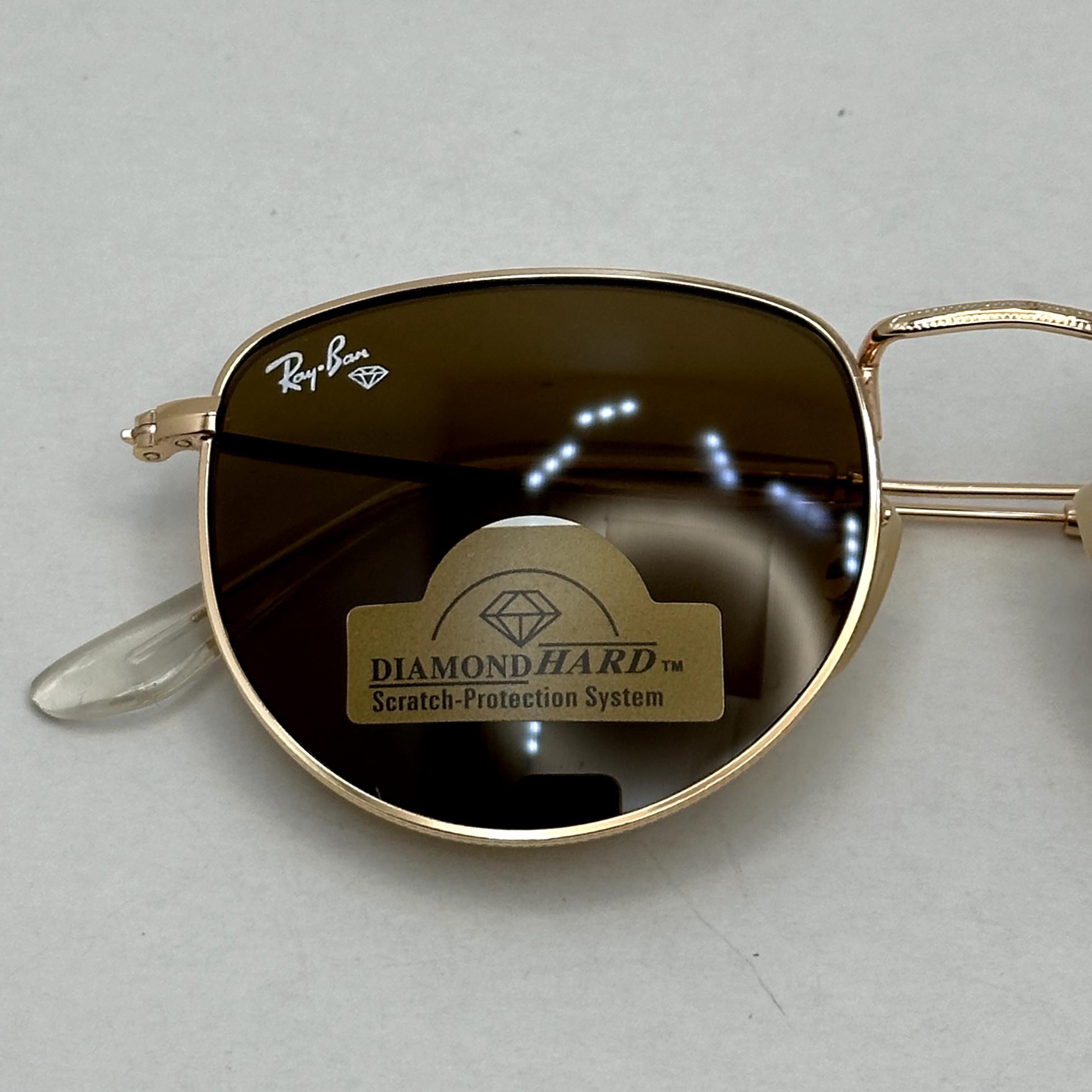 عینک آفتابی ریبن rayban شیشه سنگ قهوه ای طلایی کد rb 3958 - فول پک (ارسال رایگان)