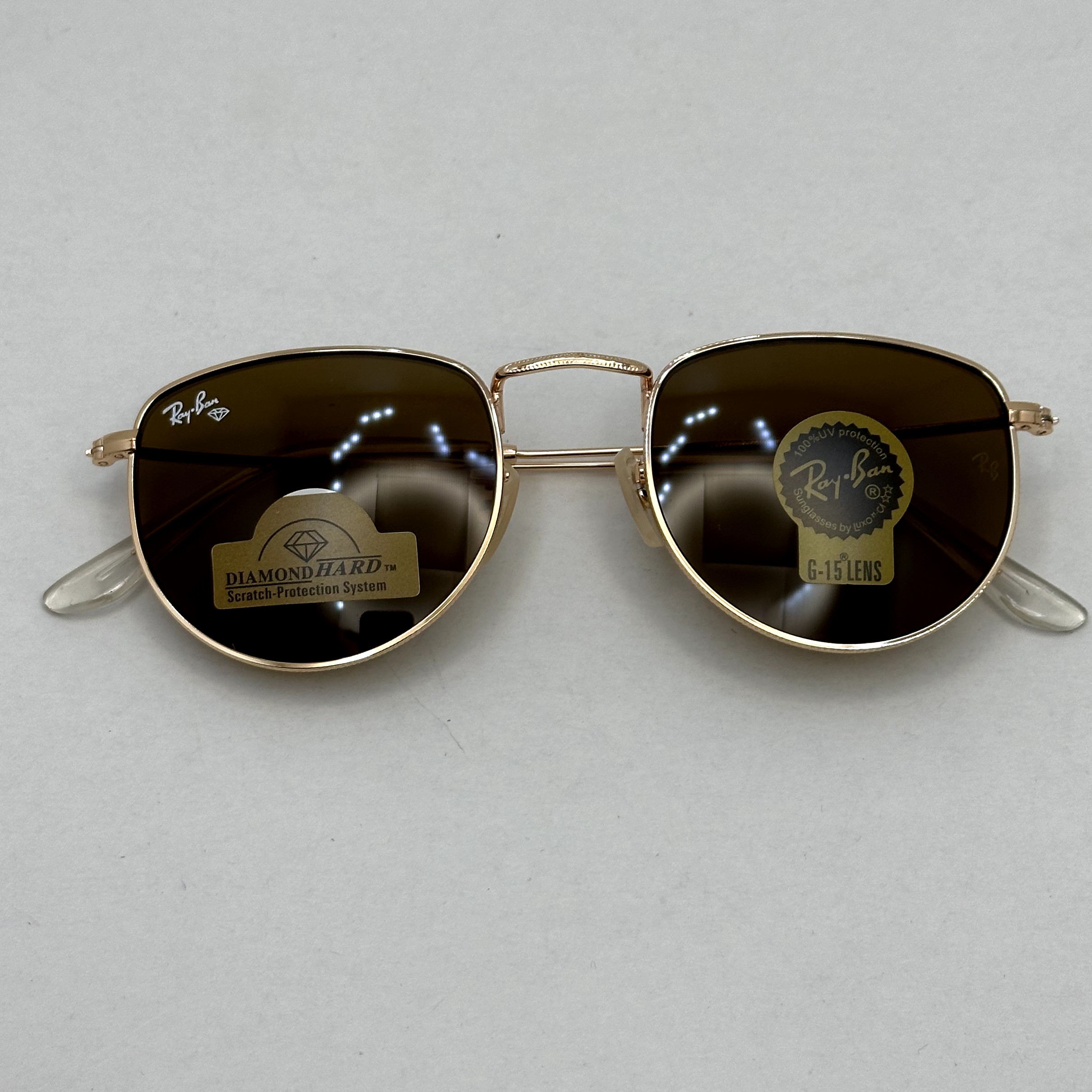 عینک آفتابی ریبن rayban شیشه سنگ قهوه ای طلایی کد rb 3958 - فول پک (ارسال رایگان)
