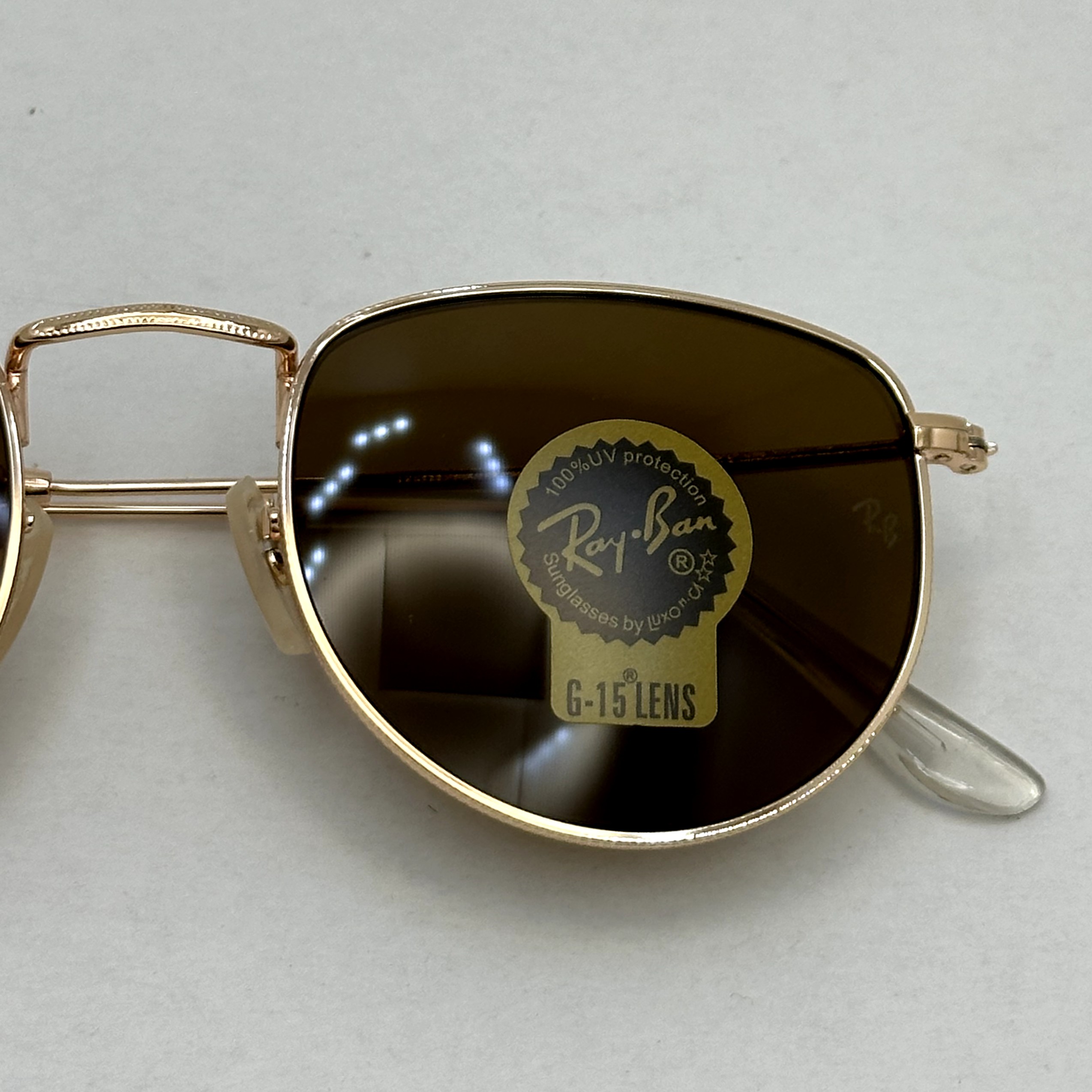 عینک آفتابی ریبن rayban شیشه سنگ قهوه ای طلایی کد rb 3958 - فول پک (ارسال رایگان)