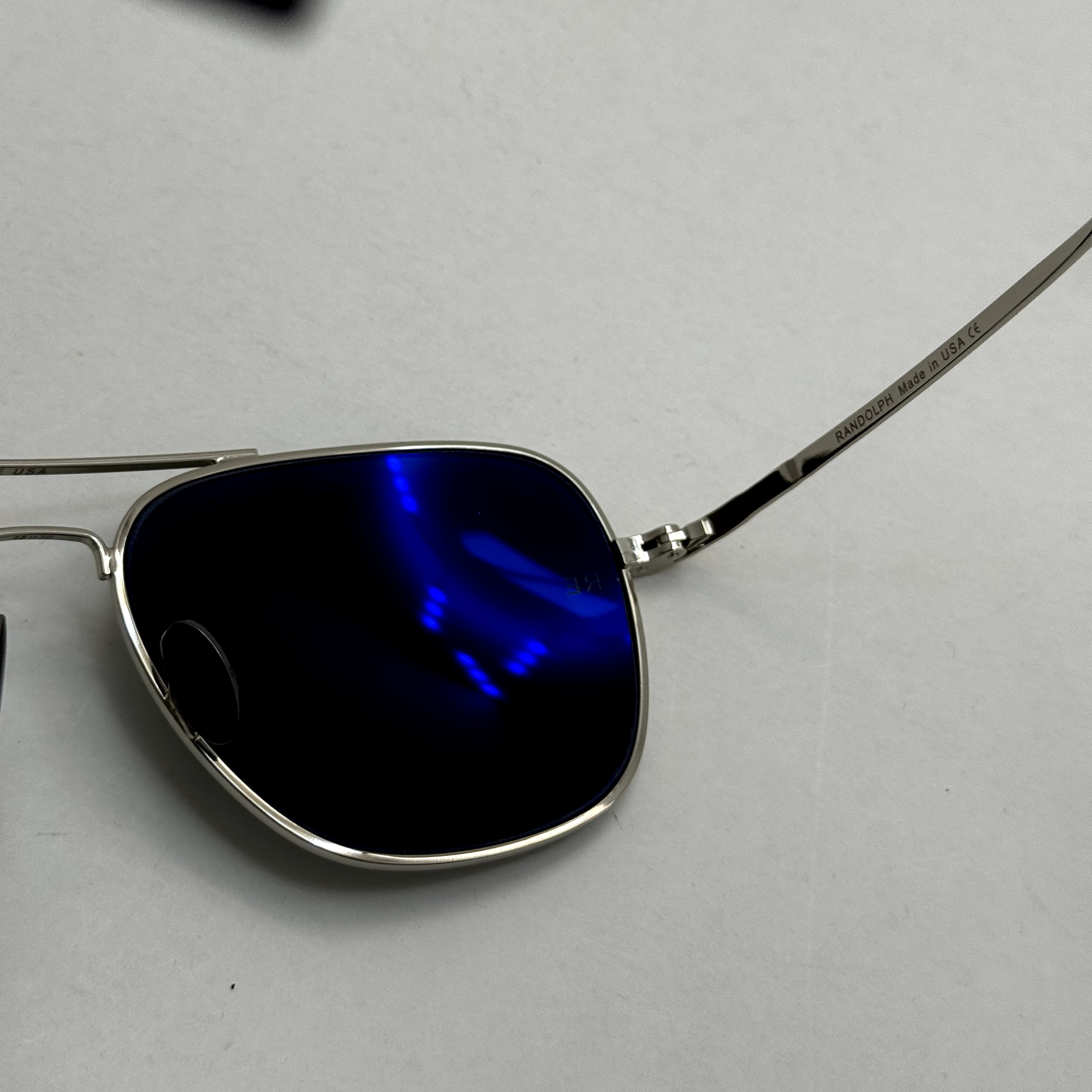 عینک آفتابی خلبانی رندولف شیشه سنگ آنتی رفلکس مشکی فریم نقره ای فول پک RANDOLPH AVIATOR RE 58 WHITE GOLD (ارسال رایگان)
