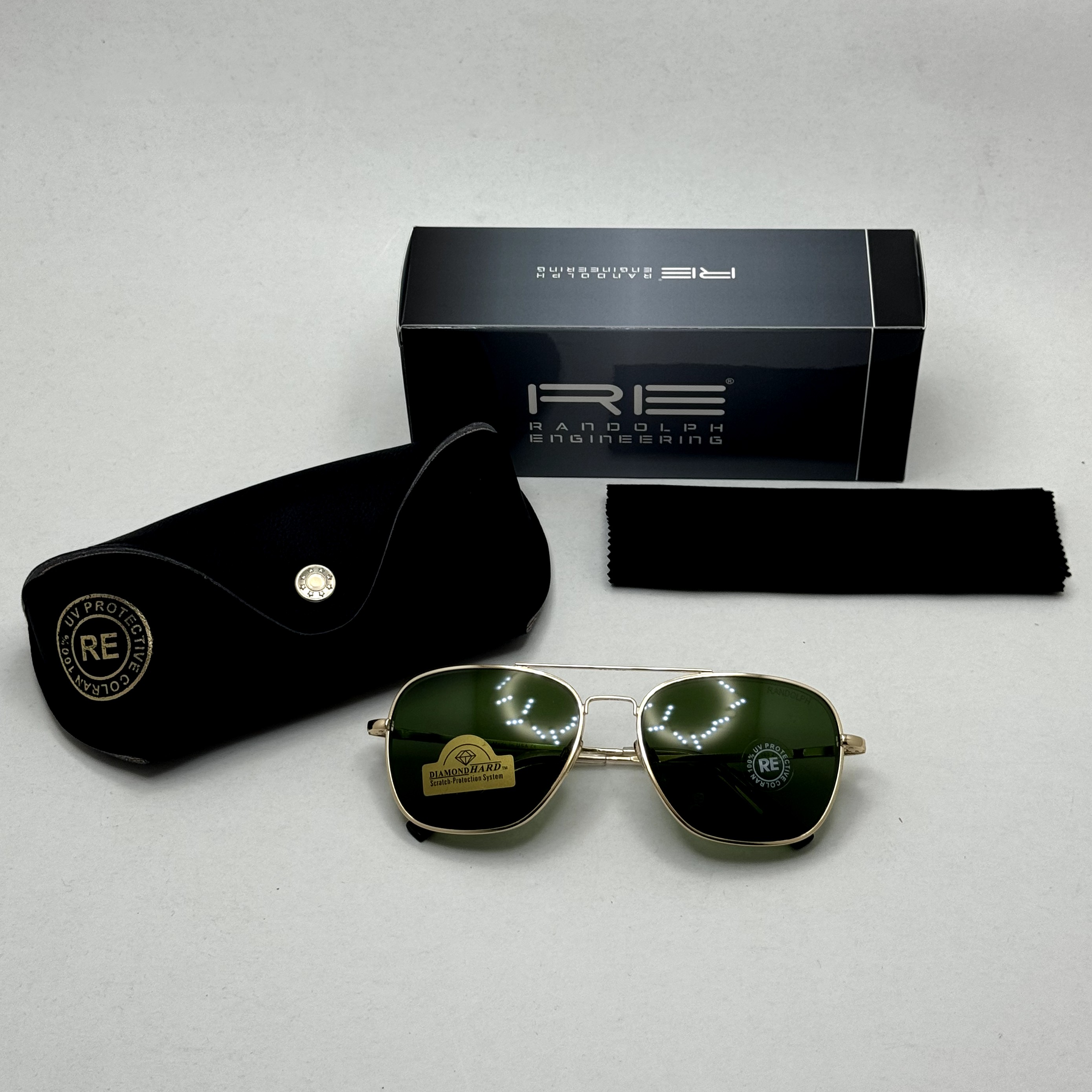 عینک آفتابی خلبانی رندولف شیشه سنگ آنتی رفلکس سبز فریم طلایی فول پک اصلی RANDOLPH AVIATOR RE 58 24K GOLD (ارسال رایگان)