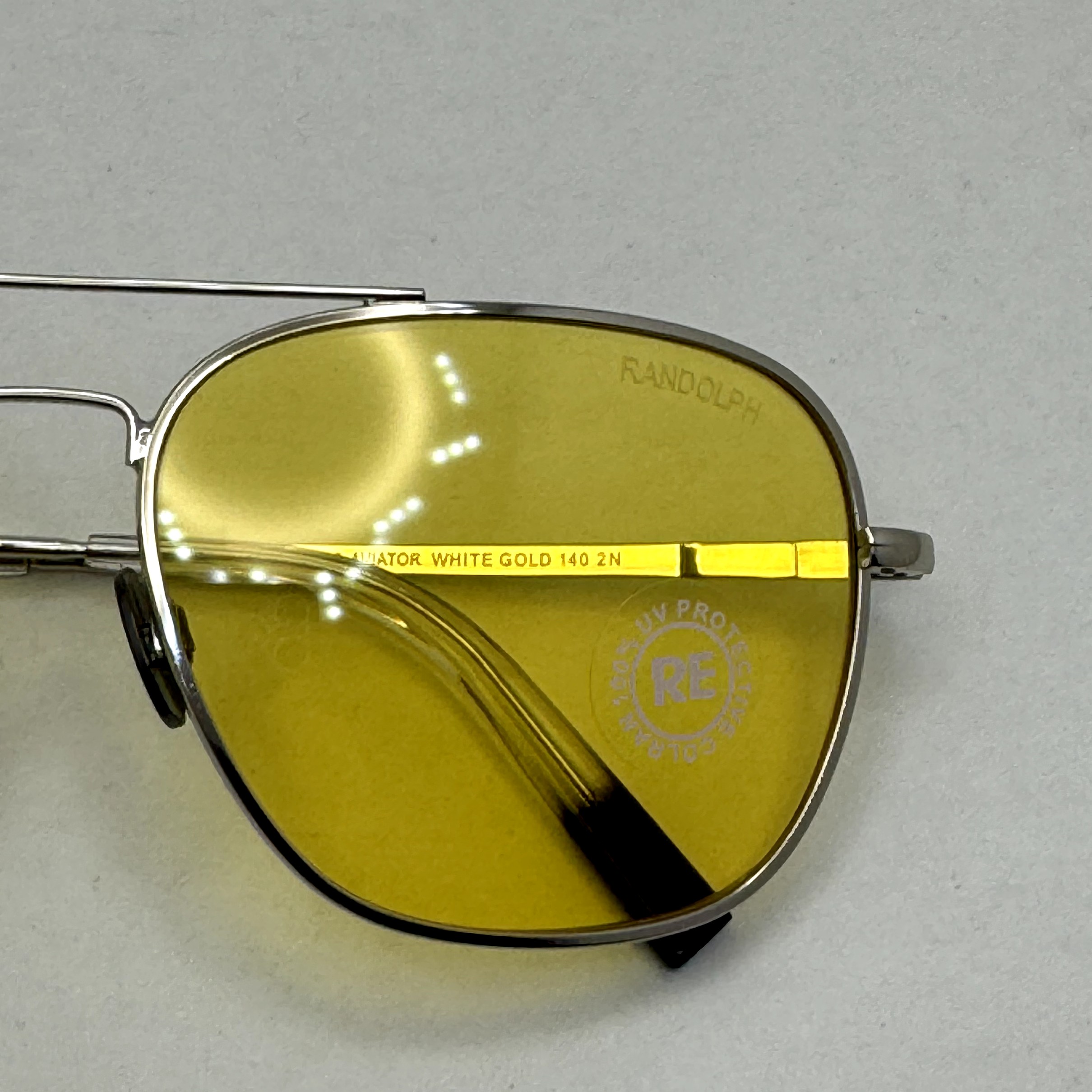 عینک آفتابی و شب خلبانی رندولف شیشه سنگ زرد فریم نقره ای فول پک اصلی RANDOLPH AVIATOR RE 58 24K WHITE GOLD (ارسال