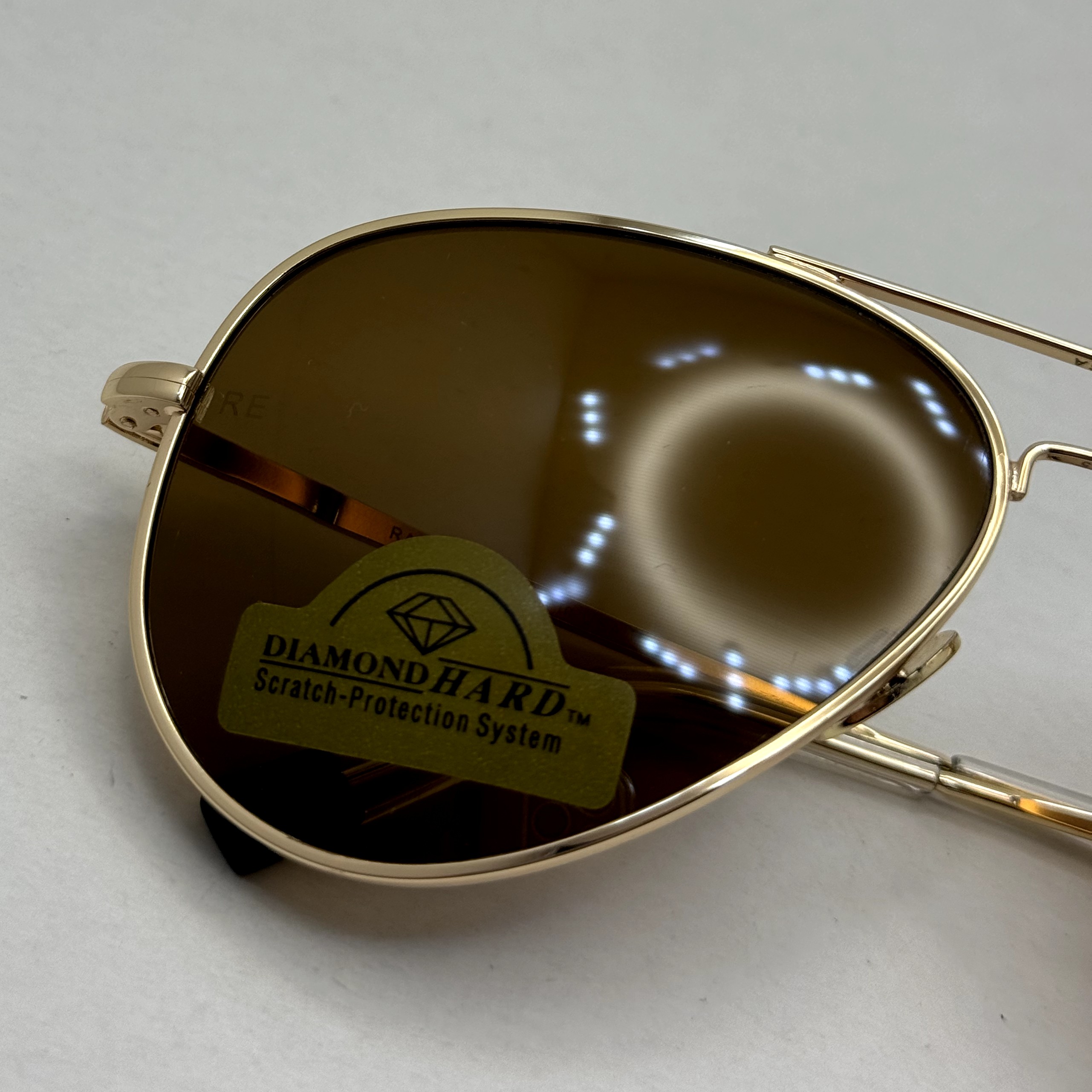 عینک آفتابی خلبانی رندولف شیشه سنگ مدل کانکورد آنتی رفلکس قهوه ای طلایی فول پک RANDOLPH CONCORD CR 231 24K GOLD