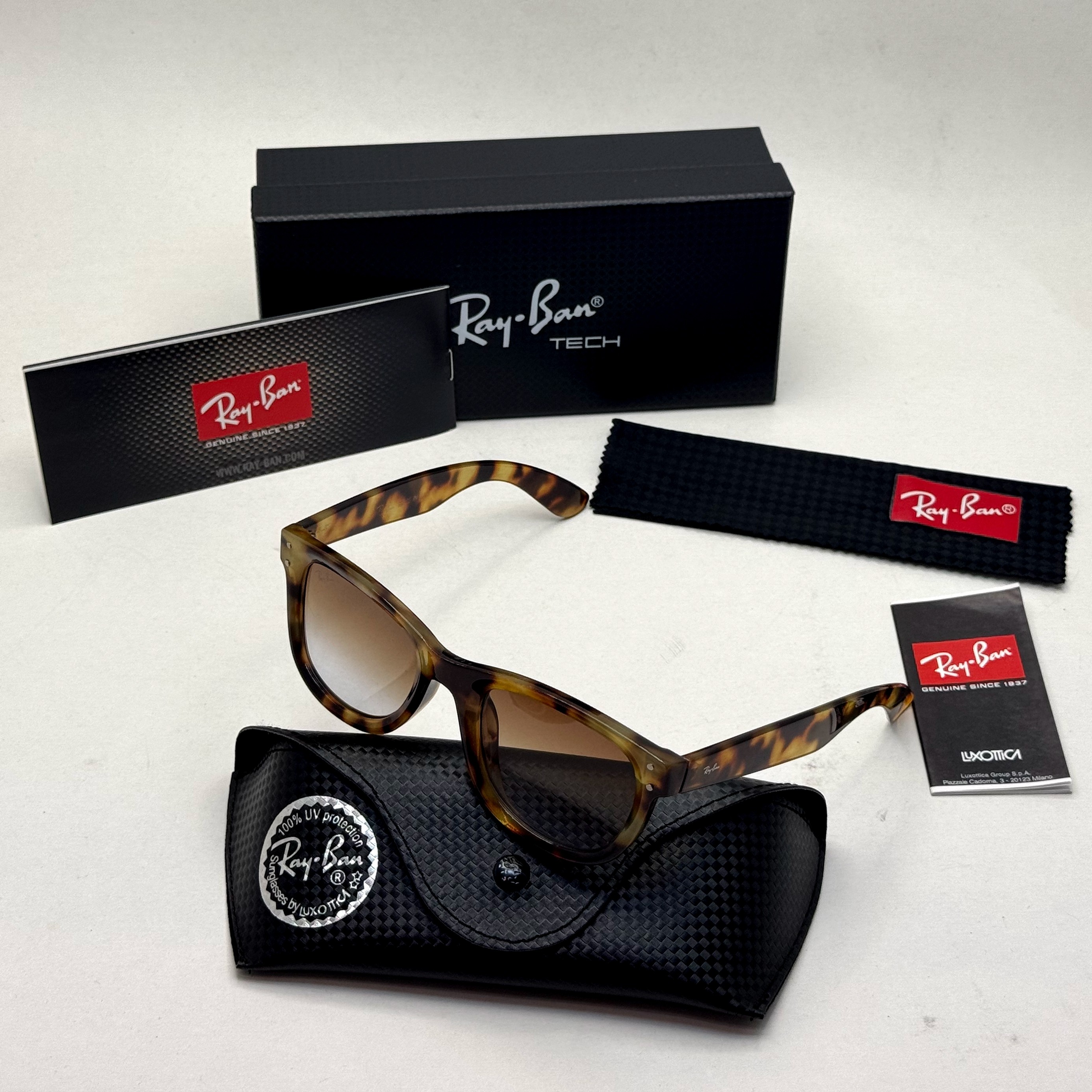 عینک آفتابی ریبن ویفرر ریورس پلنگی به همراه پک کامل rayban (ارسال رایگان)