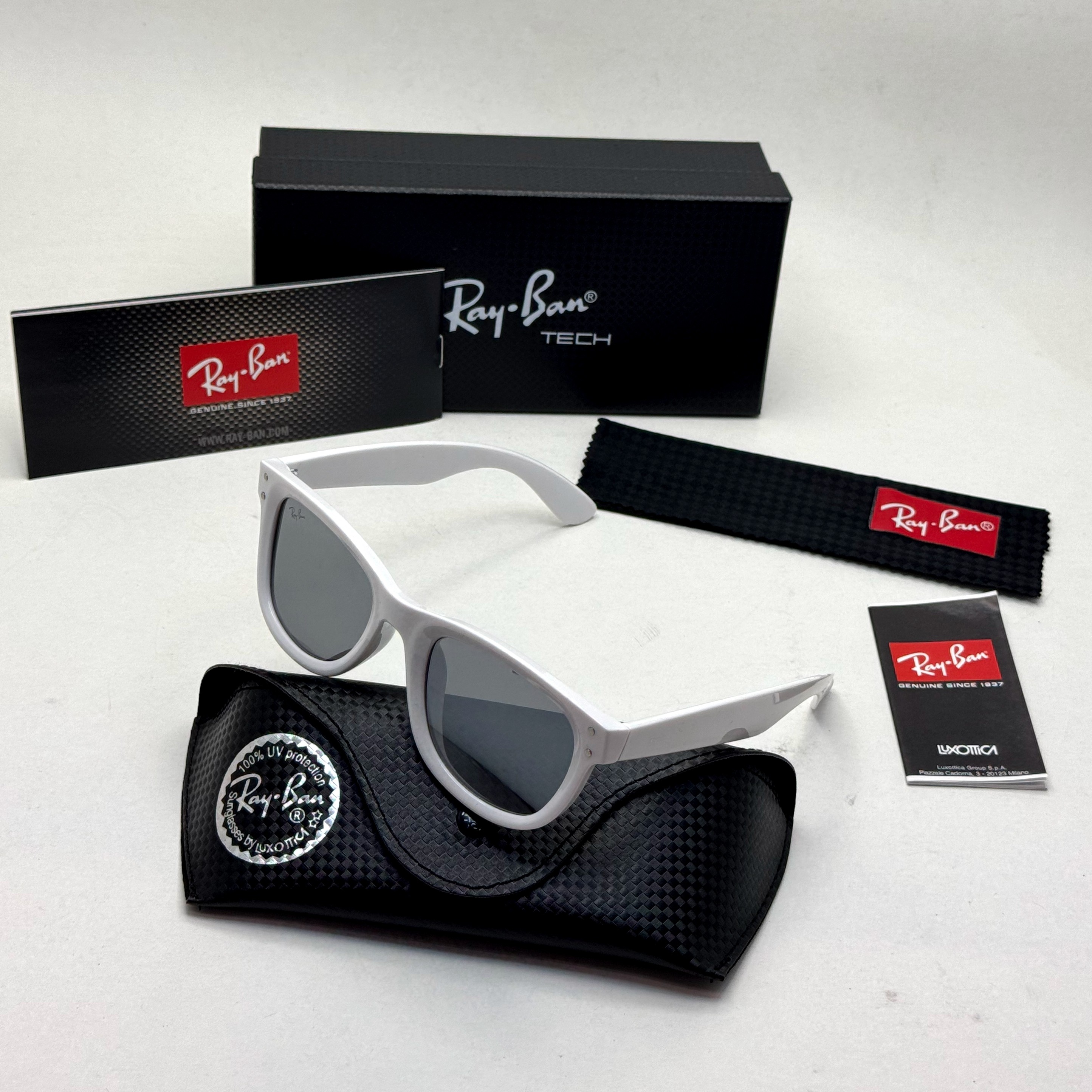 عینک آفتابی ریبن ویفرر ریورس سفید به همراه پک کامل rayban (ارسال رایگان)