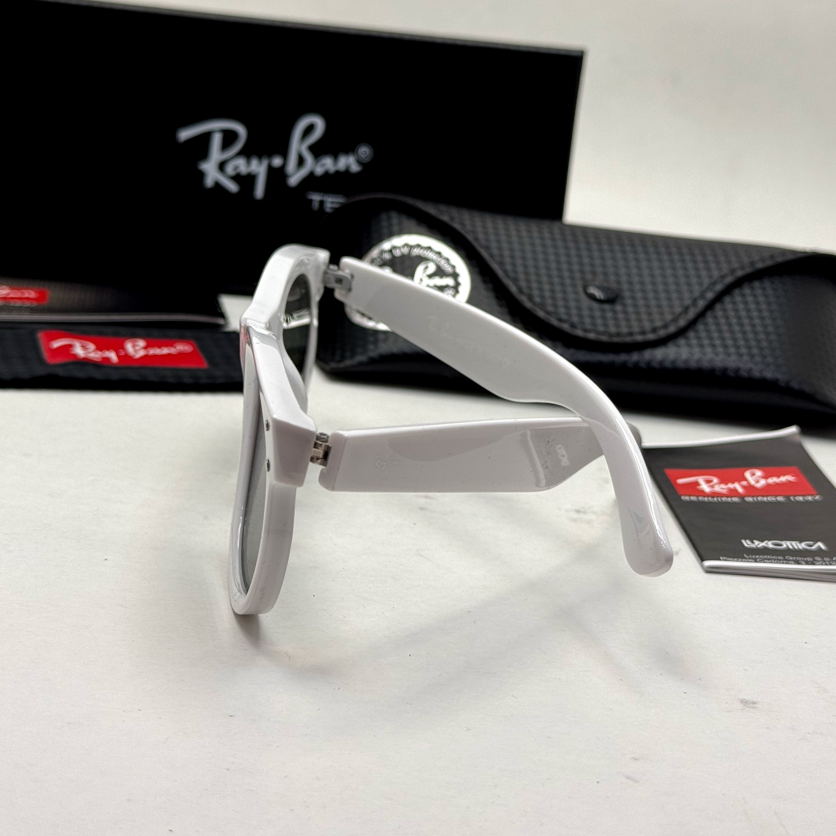 عینک آفتابی ریبن ویفرر ریورس سفید به همراه پک کامل rayban (ارسال رایگان)