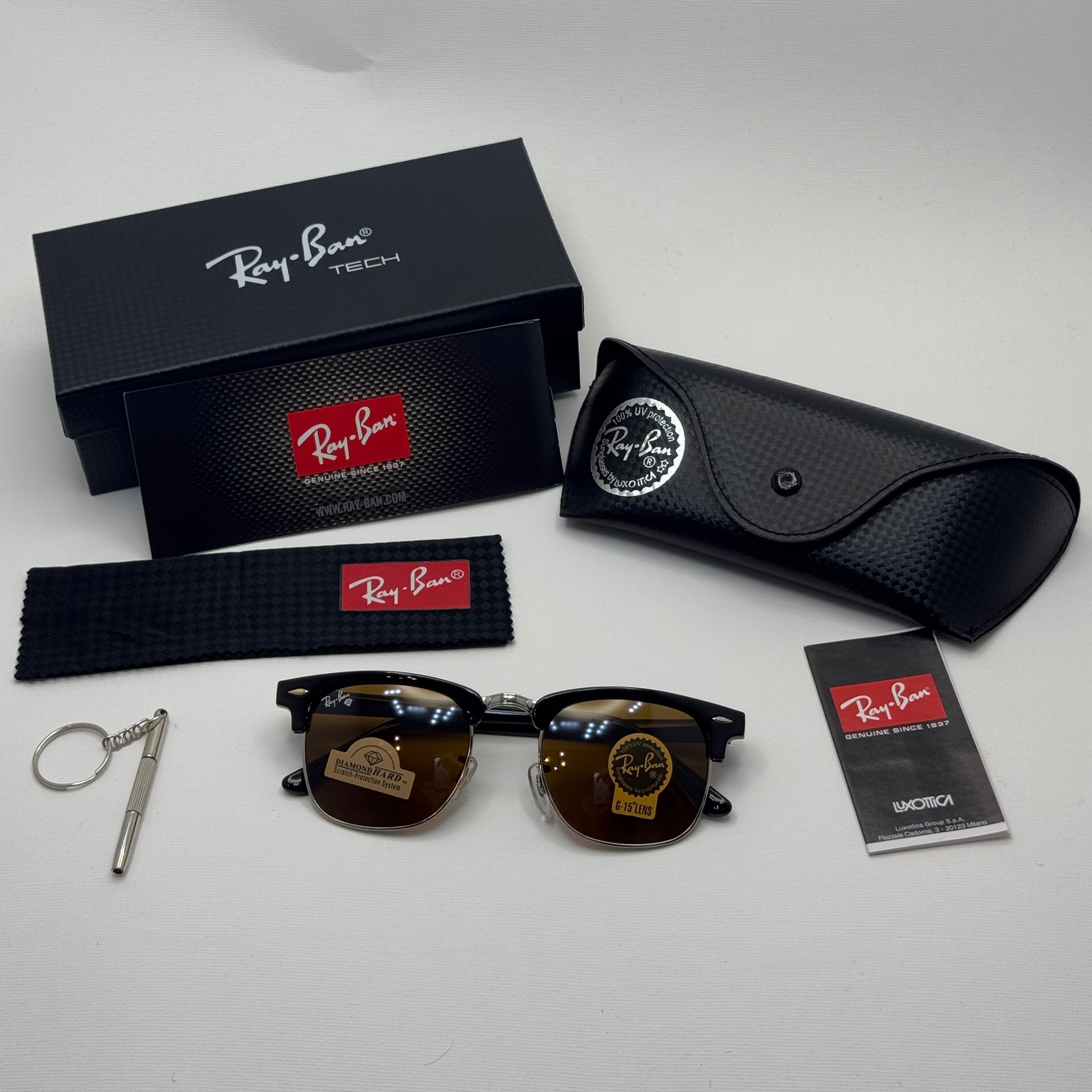 عینک آفتابی ریبن rayban کلاب مستر شیشه سنگ قهوه ای فریم نقره ای rb 3016 به همراه پک کامل (ارسال رایگان)