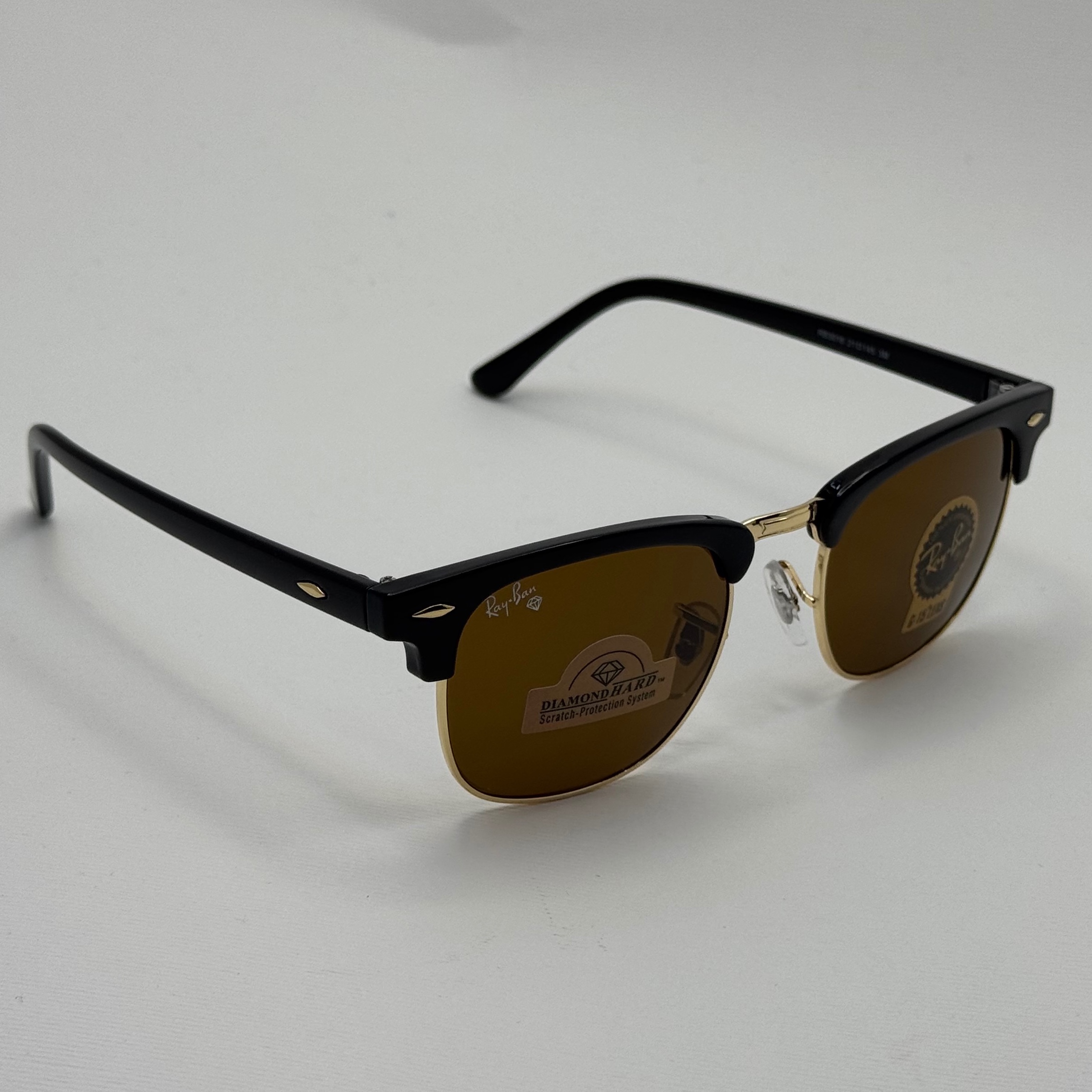 عینک آفتابی ریبن rayban کلاب مستر شیشه سنگ قهوه ای فریم طلایی rb 3016 به همراه پک کامل (ارسال رایگان)