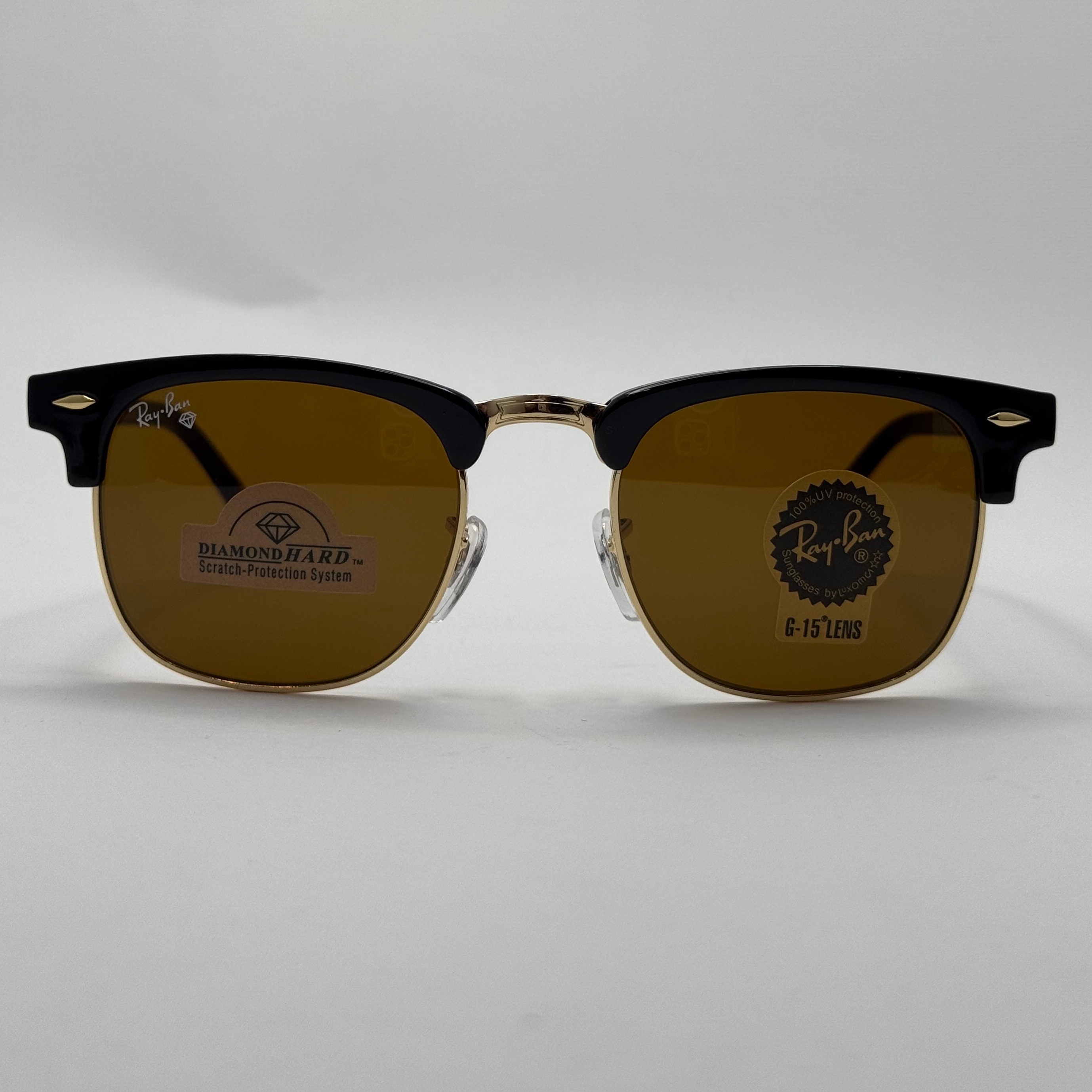 عینک آفتابی ریبن rayban کلاب مستر شیشه سنگ قهوه ای فریم طلایی rb 3016 به همراه پک کامل (ارسال رایگان)