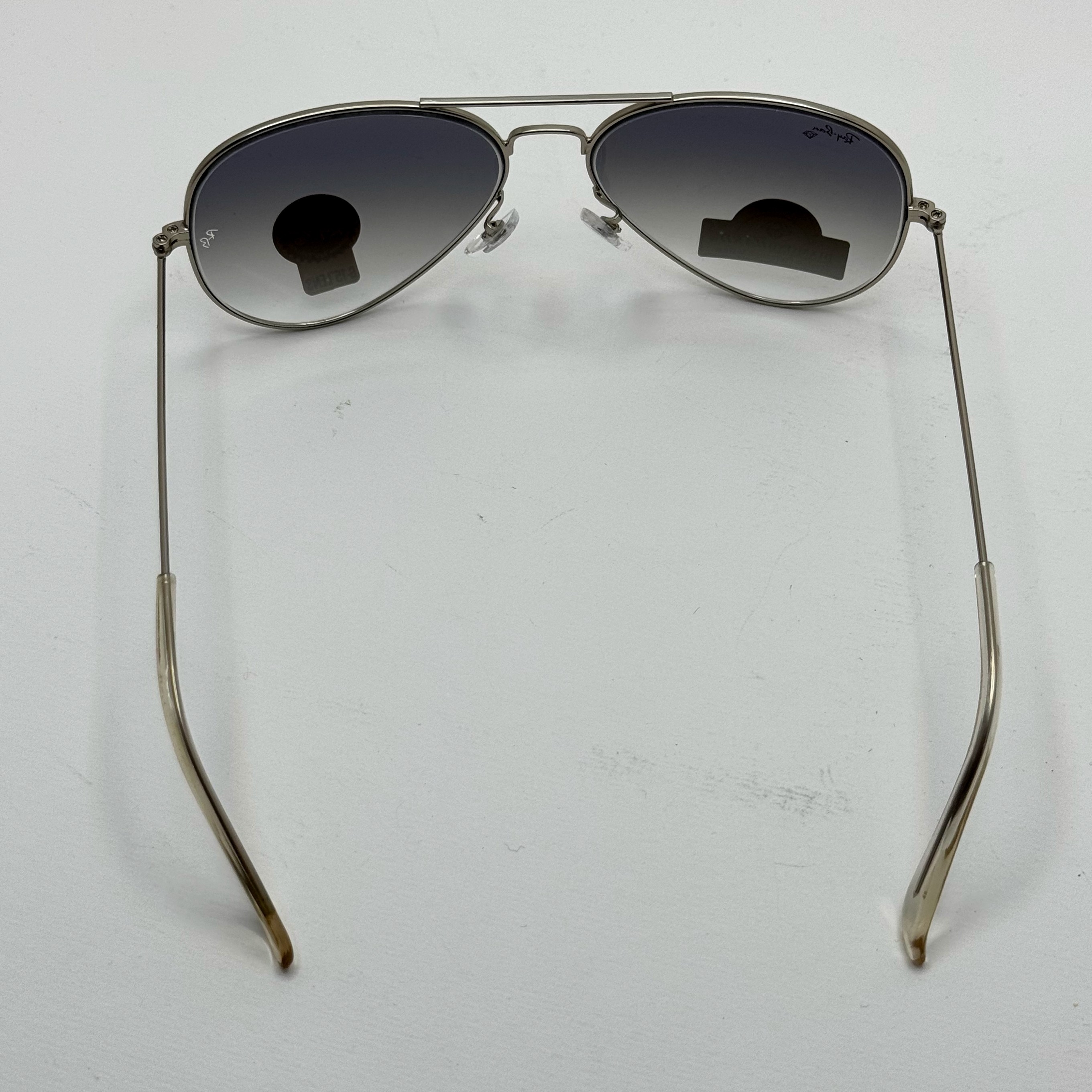 عینک ریبن خلبانی شیشه سنگ آبی هایلایت فریم نقره ای به همراه پک کامل ریبن کد Rayban RB 3025 (ارسال رایگان)