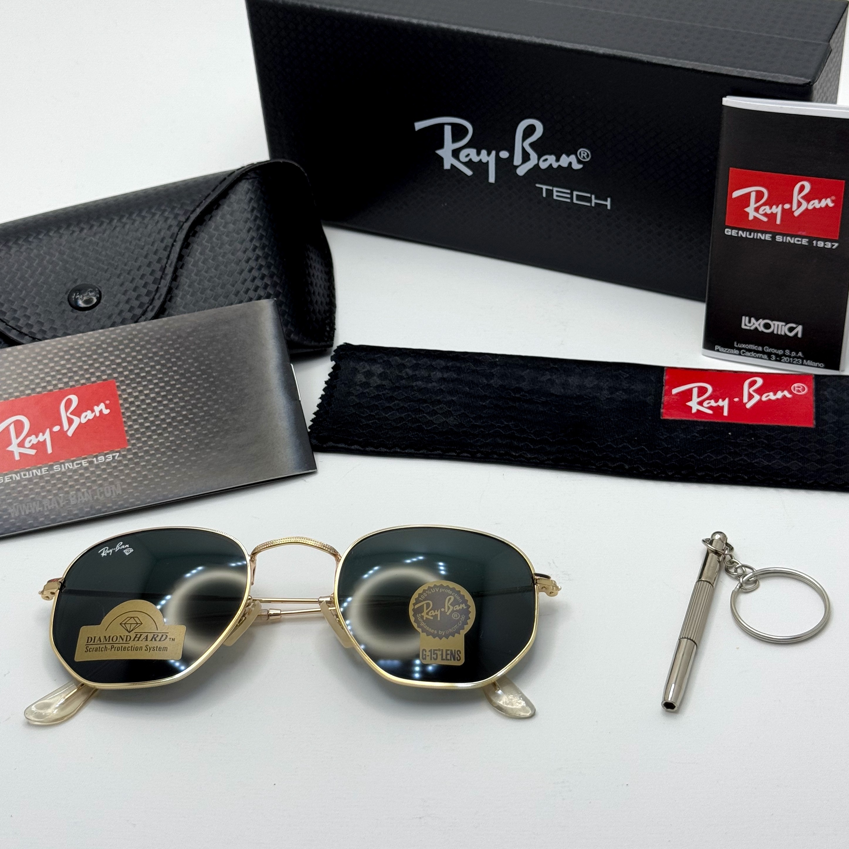عینک ریبن هگزونال شیشه سنگ مشکی فریم طلایی به همراه پک کامل ریبن کد Rayban RB 3548 (ارسال رایگان)