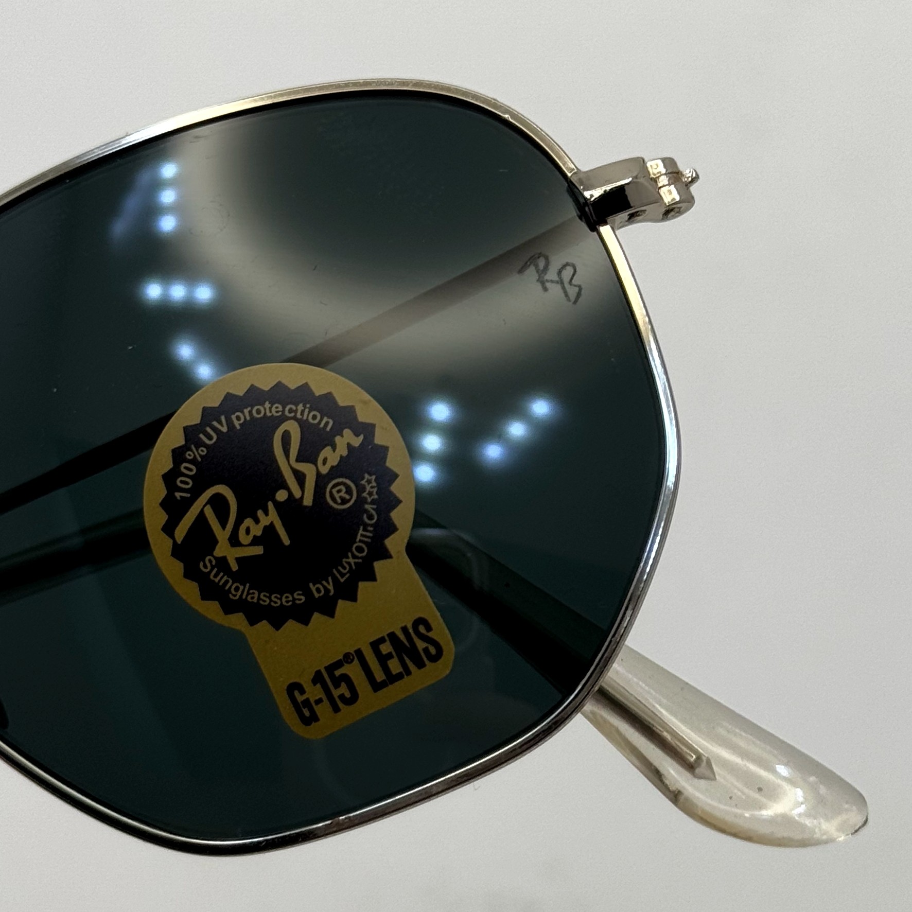 عینک ریبن هگزونال شیشه سنگ مشکی فریم نقره ای به همراه پک کامل ریبن کد Rayban RB 3548 (ارسال رایگان)