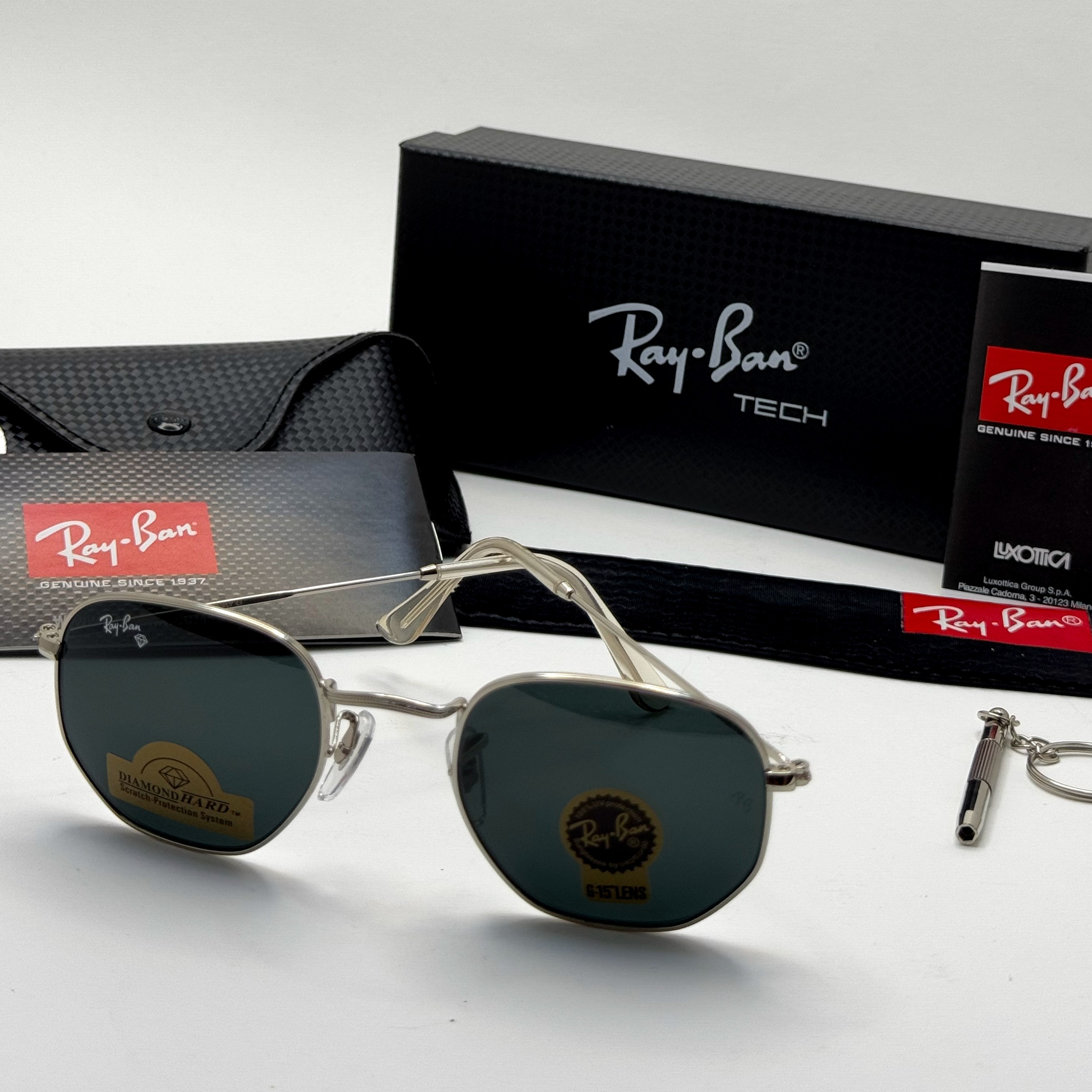 عینک ریبن هگزونال شیشه سنگ مشکی فریم نقره ای به همراه پک کامل ریبن کد Rayban RB 3548 (ارسال رایگان)