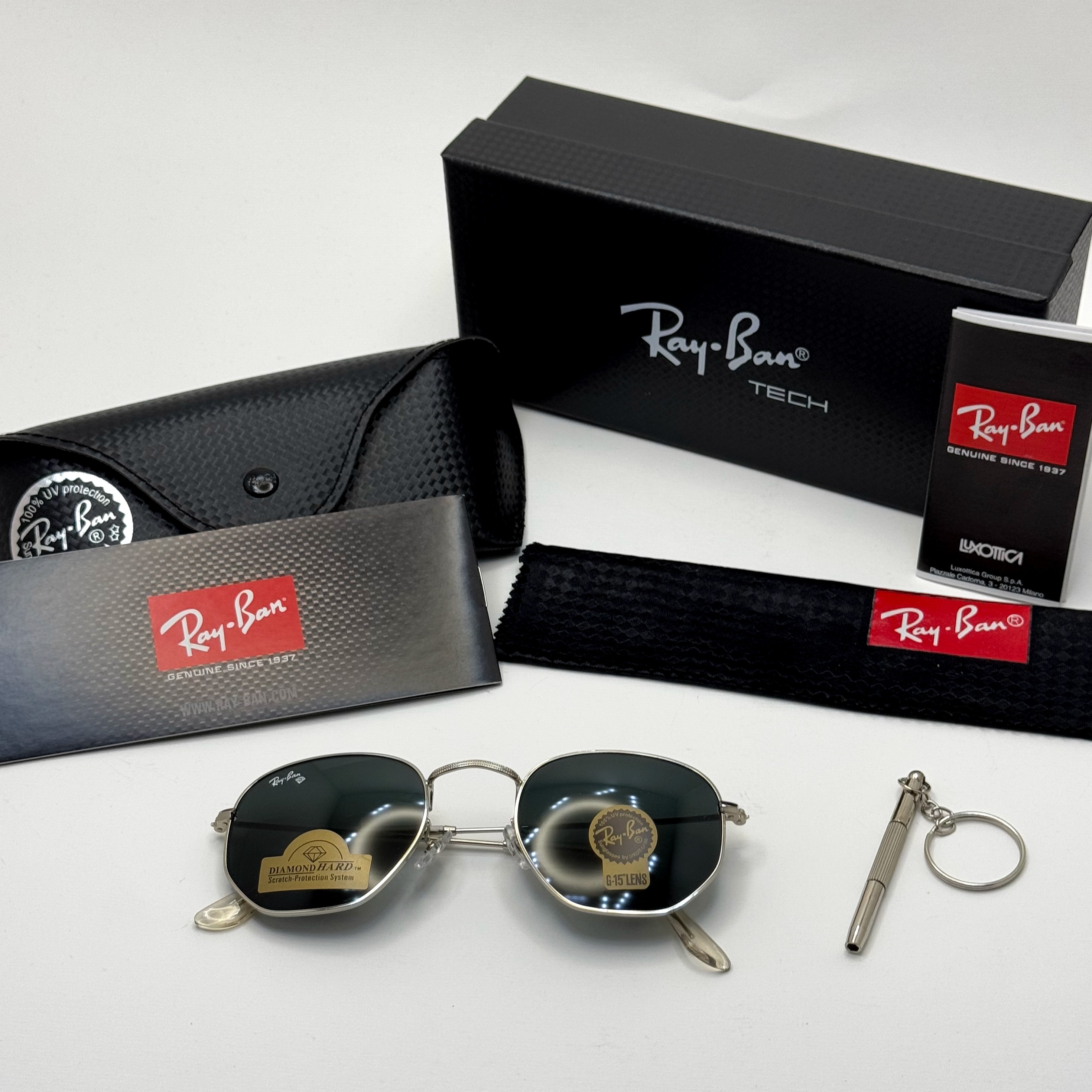 عینک ریبن هگزونال شیشه سنگ مشکی فریم نقره ای به همراه پک کامل ریبن کد Rayban RB 3548 (ارسال رایگان)