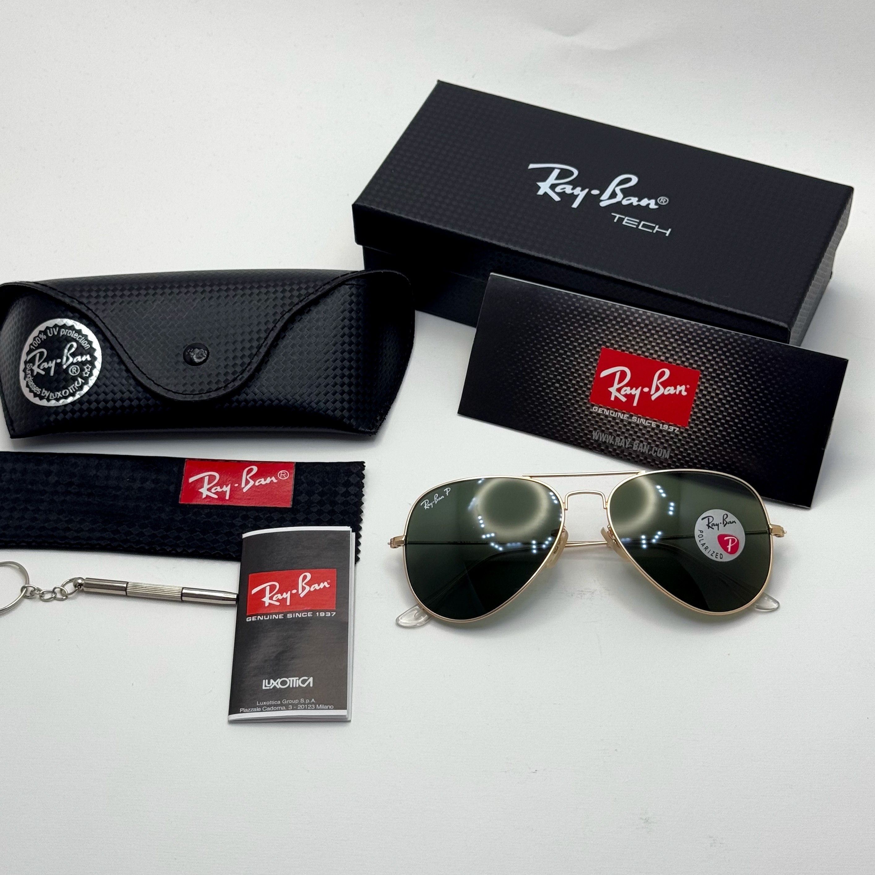 عینک ریبن خلبانی شیشه سنگ پلاریزه سبز با فریم طلایی به همراه پک کامل ریبن کد Rayban RB 3026 (ارسال رایگان)