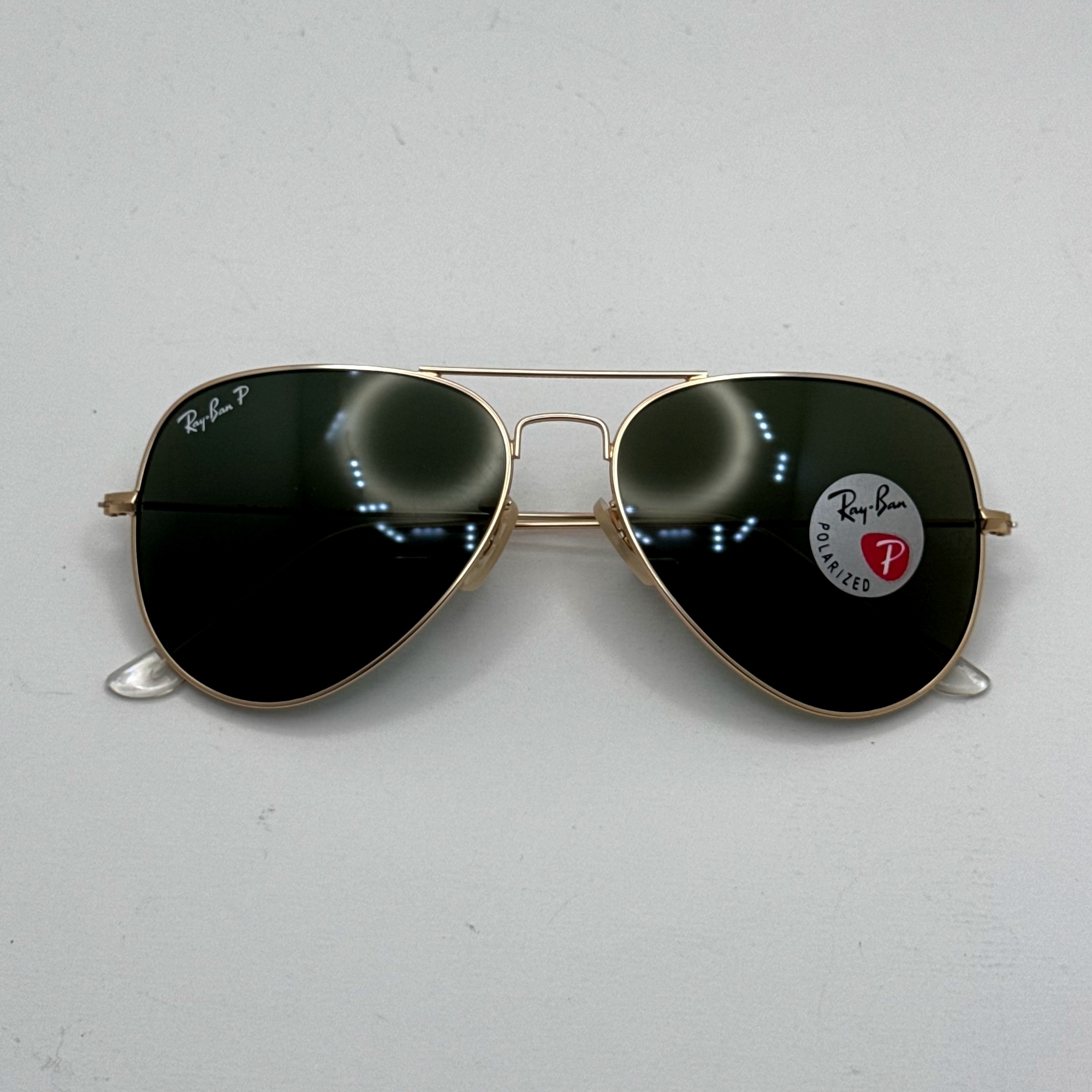عینک ریبن خلبانی شیشه سنگ پلاریزه سبز با فریم طلایی به همراه پک کامل ریبن کد Rayban RB 3026 (ارسال رایگان)