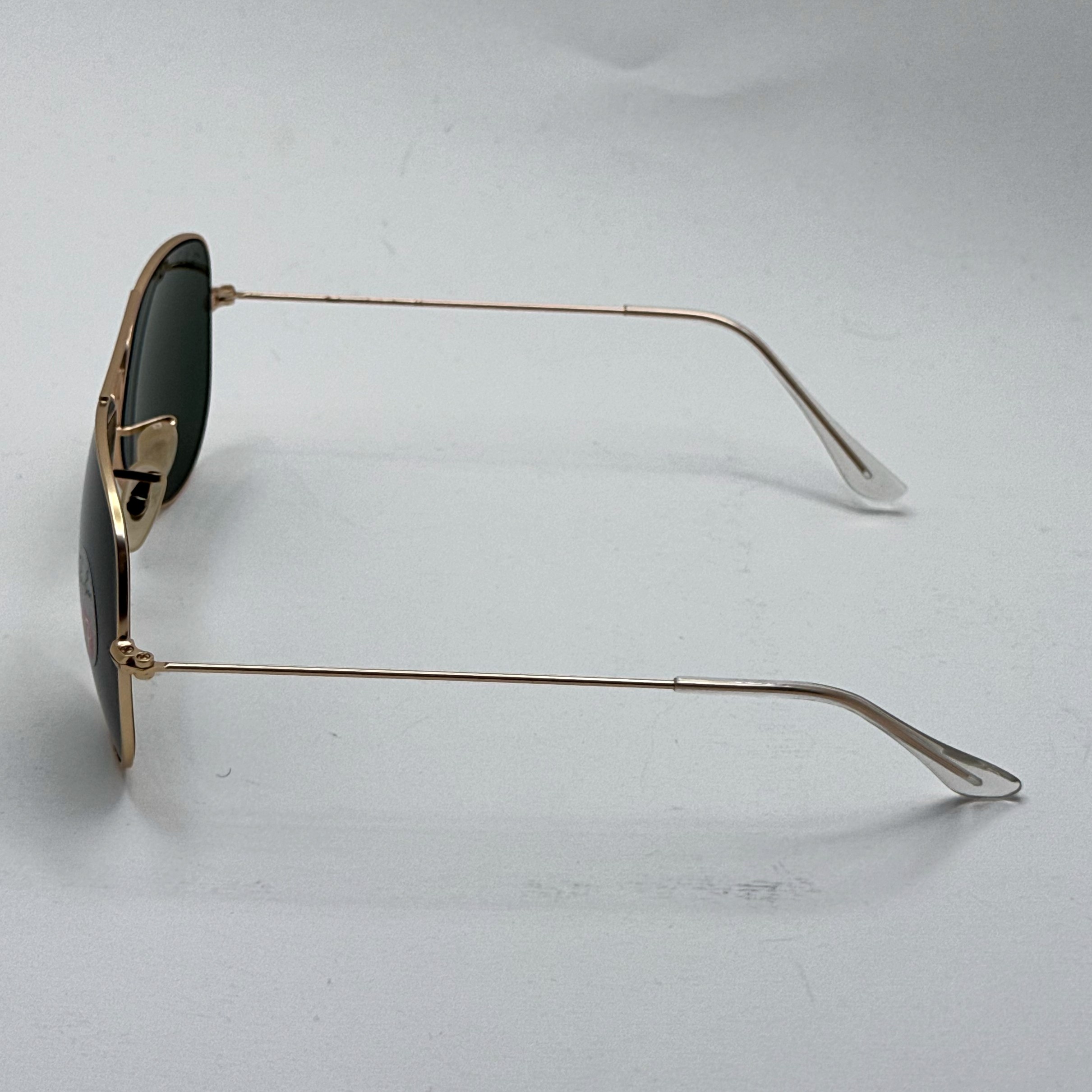 عینک ریبن خلبانی شیشه سنگ پلاریزه سبز با فریم طلایی به همراه پک کامل ریبن کد Rayban RB 3026 (ارسال رایگان)