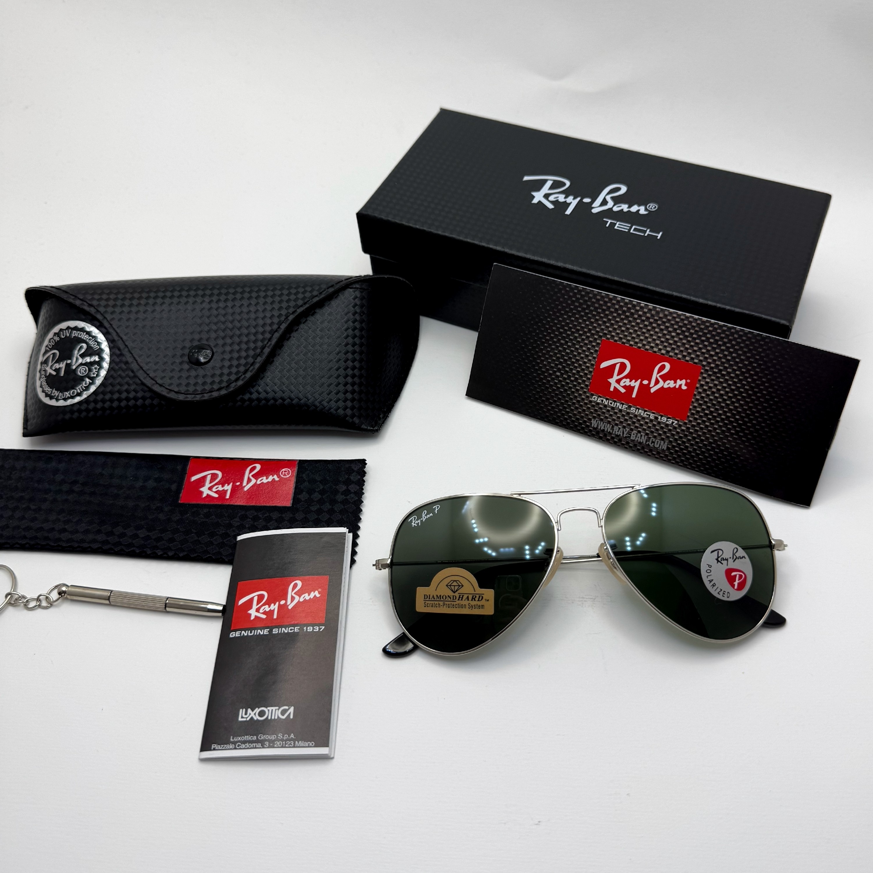 عینک ریبن خلبانی شیشه سنگ پلاریزه سبز با فریم نقره ای به همراه پک کامل ریبن کد Rayban RB 3026 (ارسال رایگان)