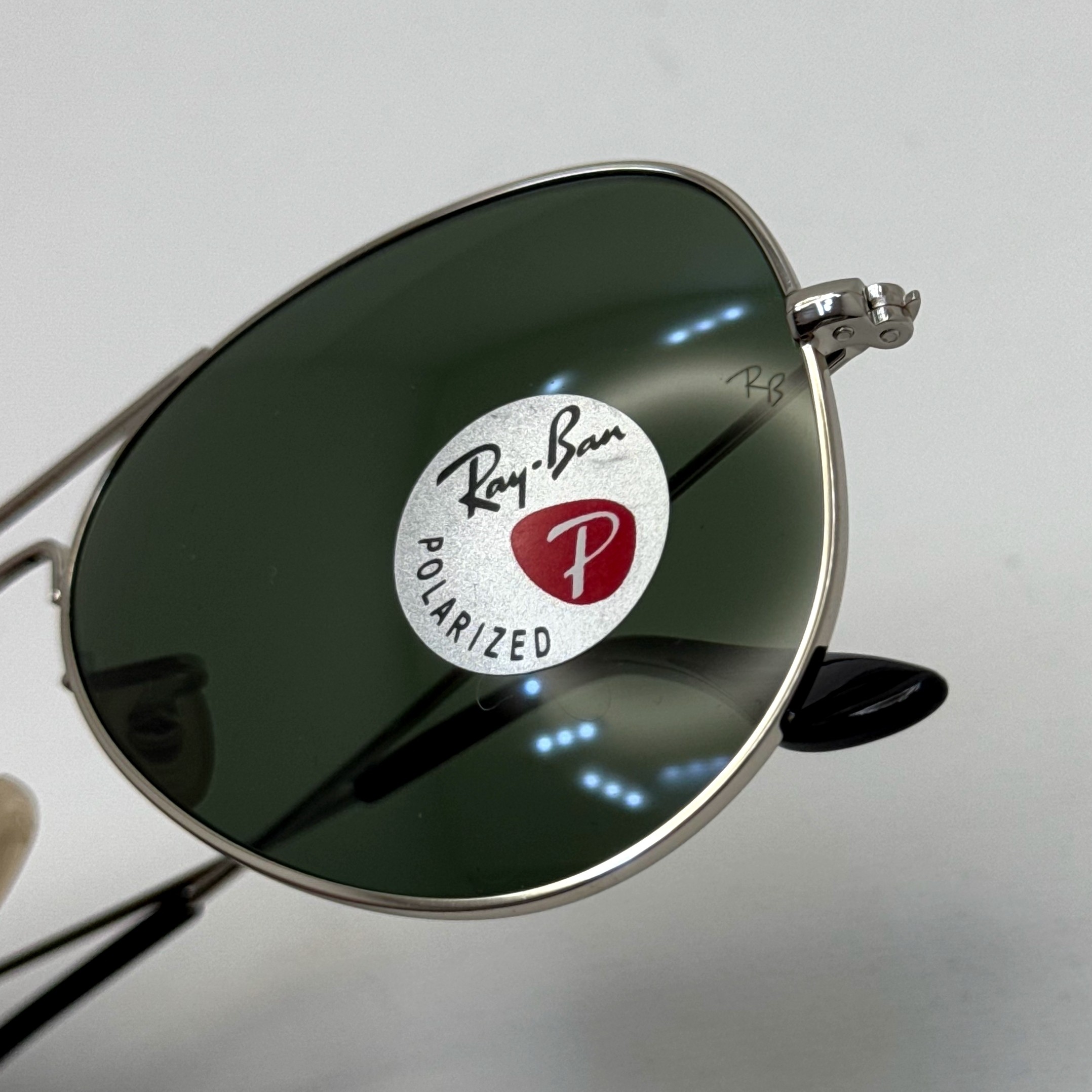 عینک ریبن خلبانی شیشه سنگ پلاریزه سبز با فریم نقره ای به همراه پک کامل ریبن کد Rayban RB 3026 (ارسال رایگان)