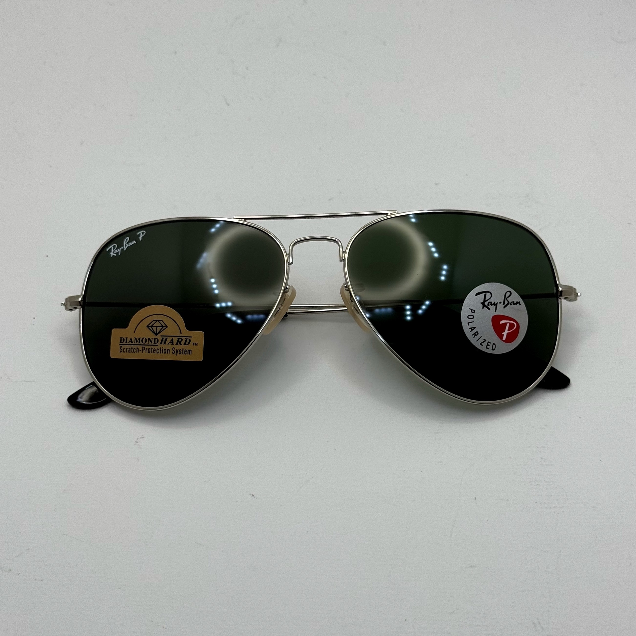 عینک ریبن خلبانی شیشه سنگ پلاریزه سبز با فریم نقره ای به همراه پک کامل ریبن کد Rayban RB 3026 (ارسال رایگان)