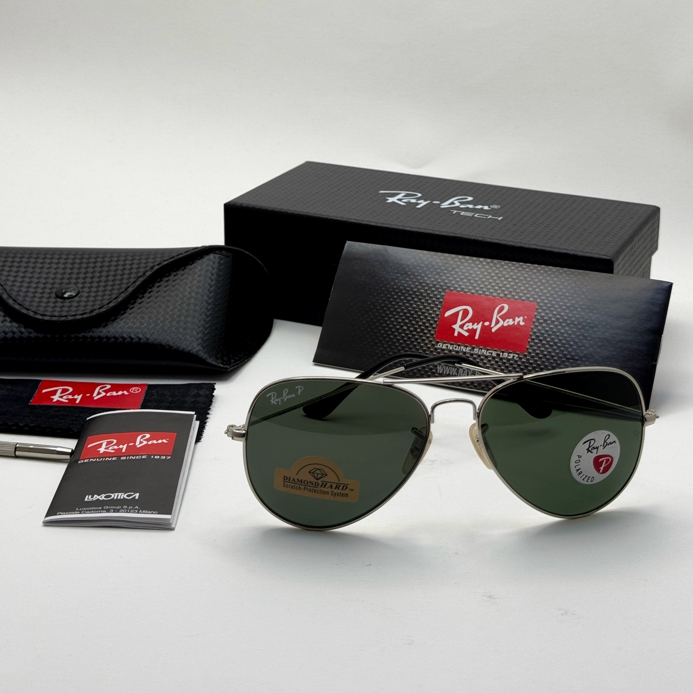 عینک ریبن خلبانی شیشه سنگ پلاریزه سبز با فریم نقره ای به همراه پک کامل ریبن کد Rayban RB 3026 (ارسال رایگان)