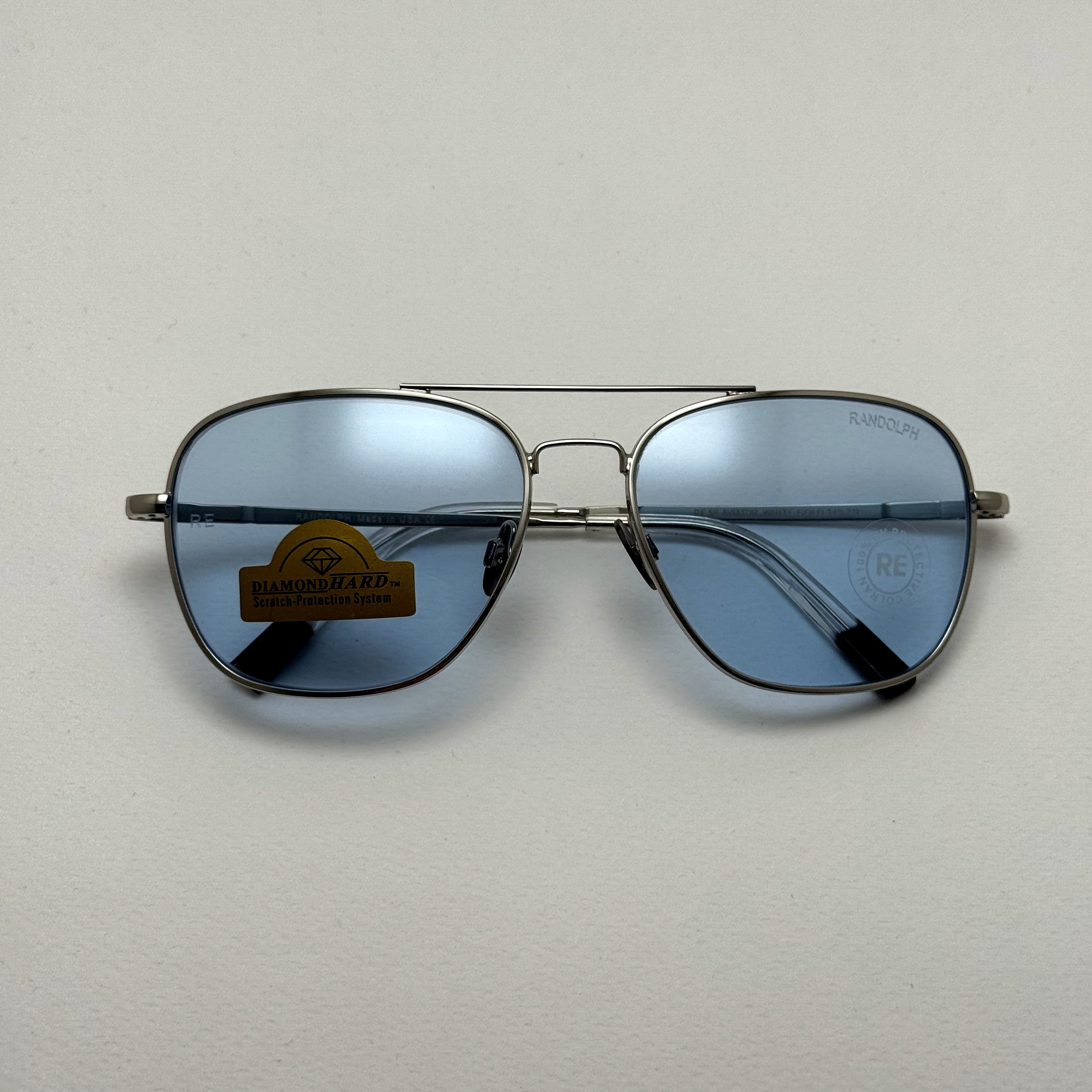 عینک شب و آفتابی خلبانی رندولف شیشه سنگ آبی آسمانی نقره ای فول پک RANDOLPH AVIATOR RE 58 24K WHITE GOLD (ارسال رایگان)