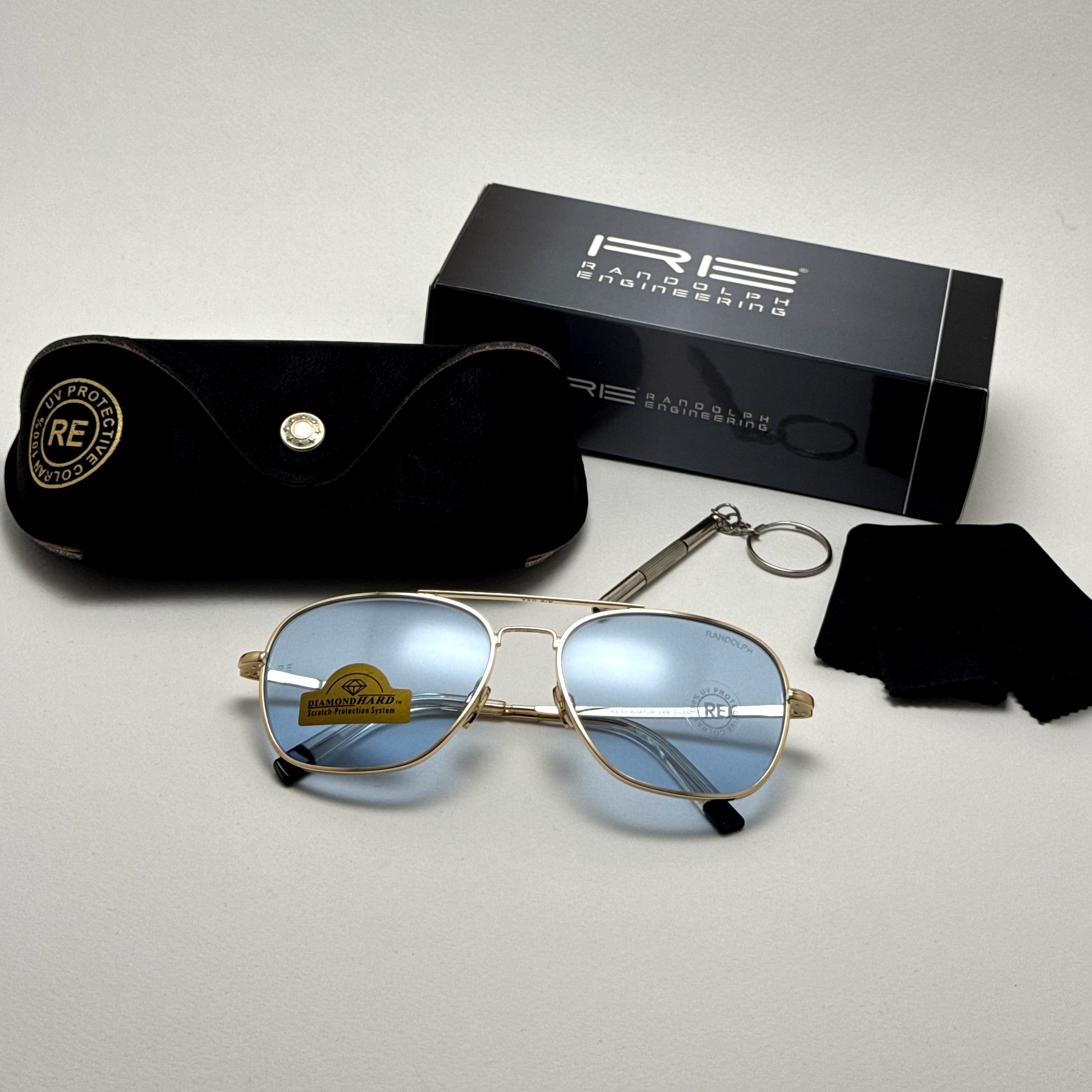 عینک آفتابی خلبانی رندولف شیشه سنگ آبی آسمانی طلایی فول پک RANDOLPH AVIATOR RE 58 24K GOLD