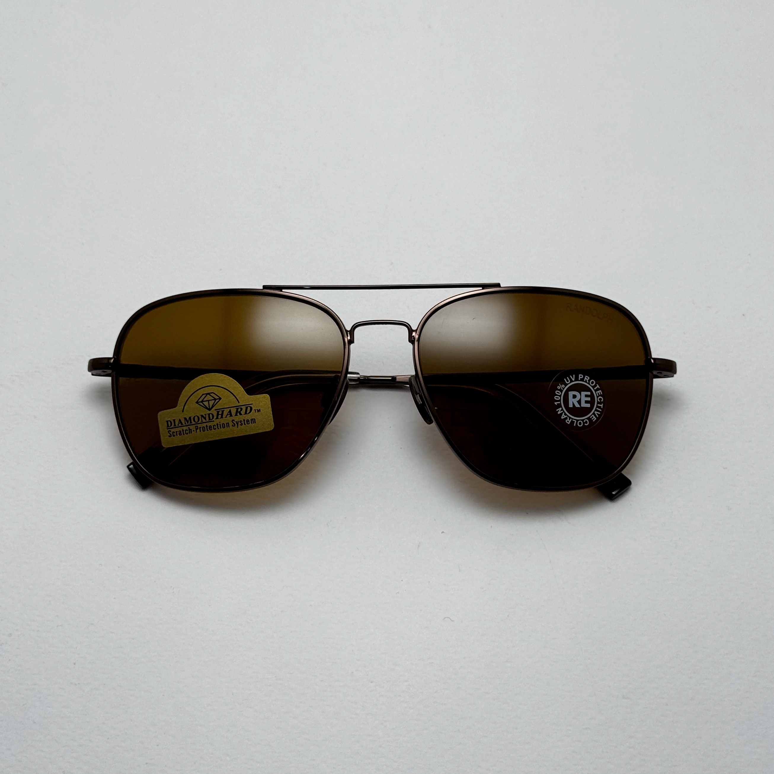 عینک آفتابی خلبانی رندولف شیشه سنگ آنتی رفلکس قهوه ای فریم قهوه ای فول پک RANDOLPH AVIATOR RE 58 24K (ارسال رایگان)