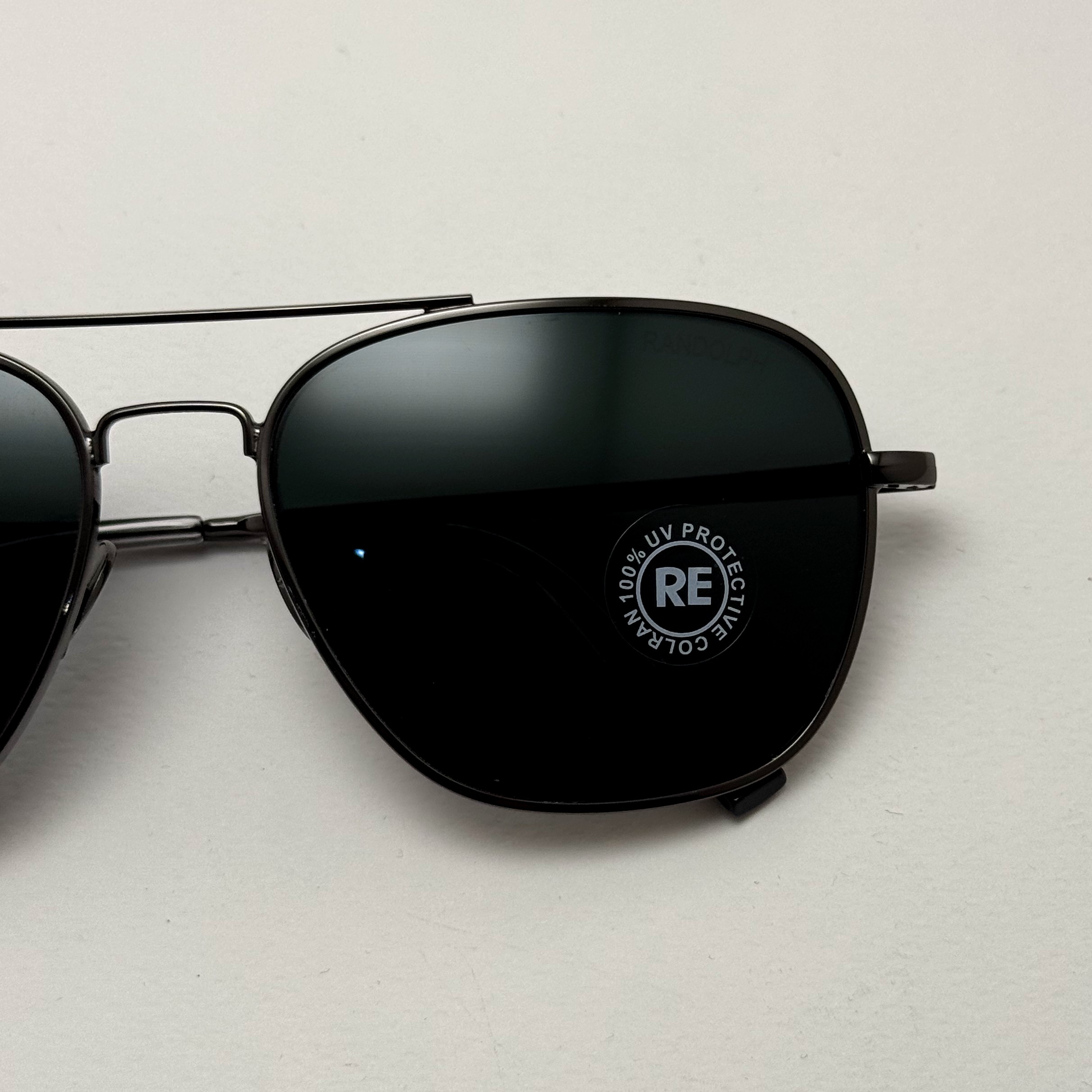 عینک آفتابی خلبانی رندولف شیشه سنگ آنتی رفلکس مشکی فریم نوک مدادی فول پک RANDOLPH AVIATOR RE 58 24K WHITE GOLD (ارسال