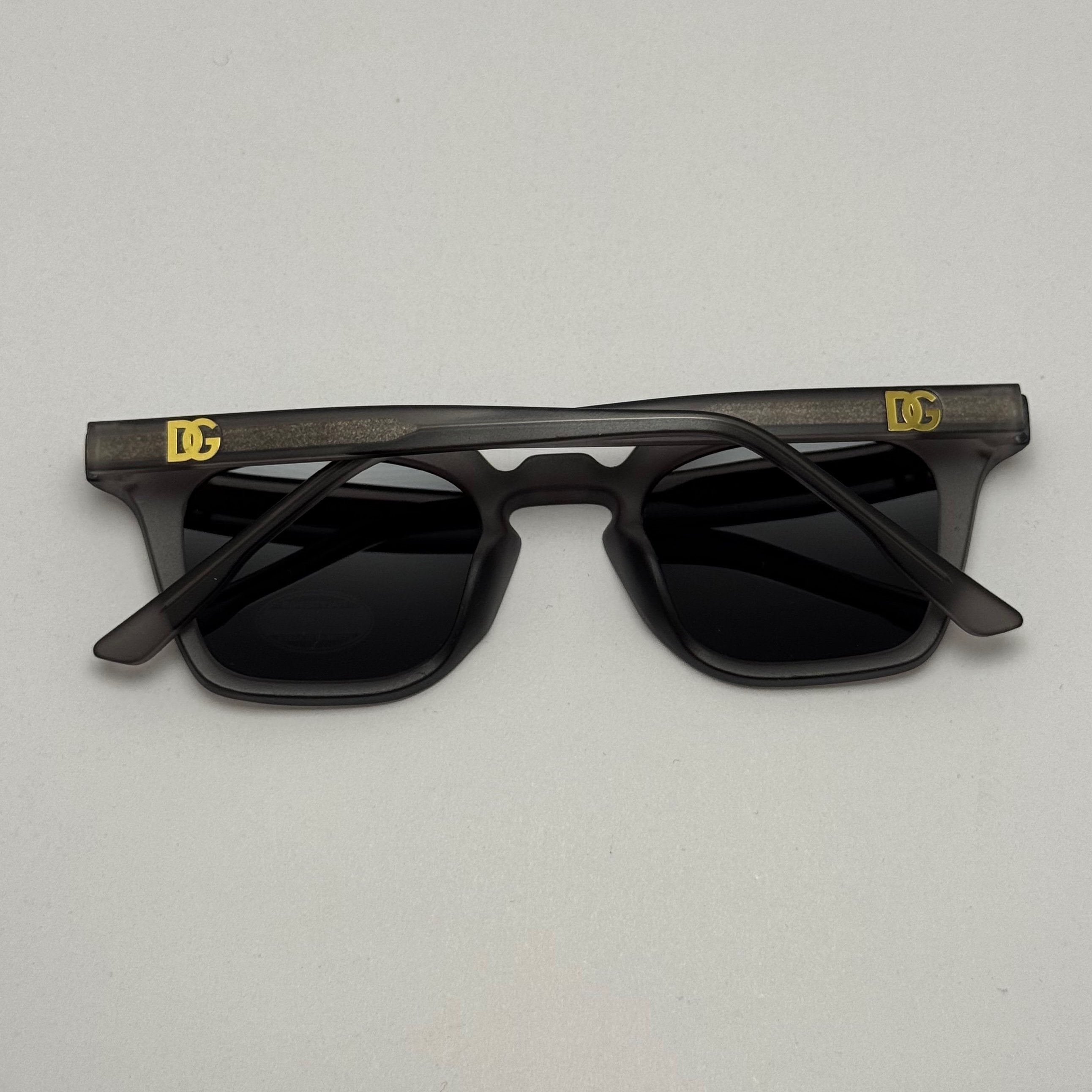 عینک آفتابی پلاریزه دولچه گابانا DOLCE GABBANA دسته سیم کشی شده لولا فنر طوسی کد 7707 (ارسال رایگان)