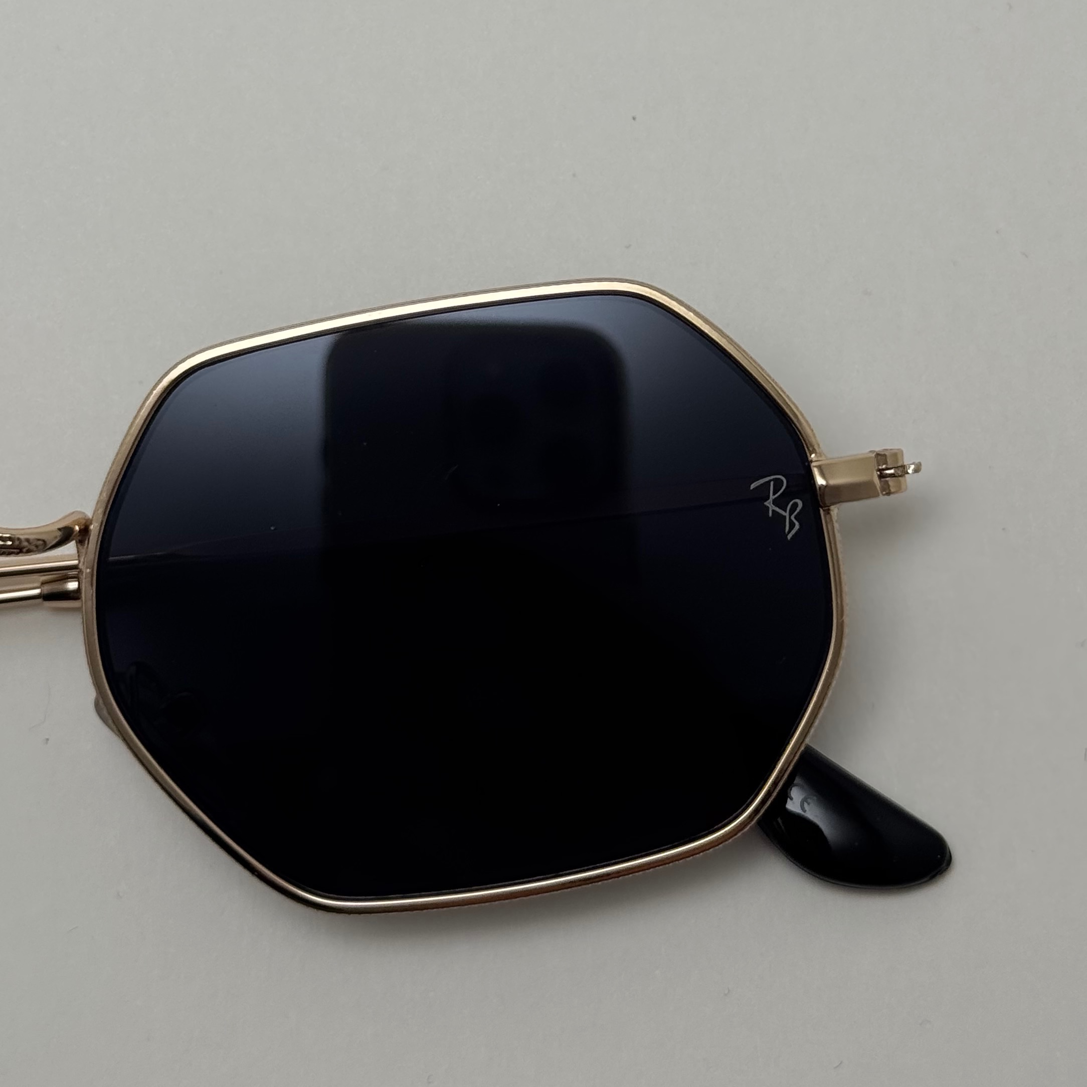 عینک آفتابی ریبن Ray-ban شش ضلعی مشکی طلایی سبک کد RB 3556